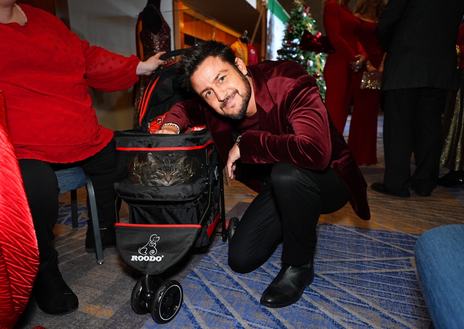 KANSAS CITY, MISSOURI - NOVEMBER 30: Catrick Mahomes the cat and Tyler Hynes attend Hallmark's Premiere Screening of Holiday Touchdown: A Chiefs Love Story on November 30, 2024 in Kansas City, Missouri. (Photo by Kyle Rivas/Getty Images for Hallmark Media)