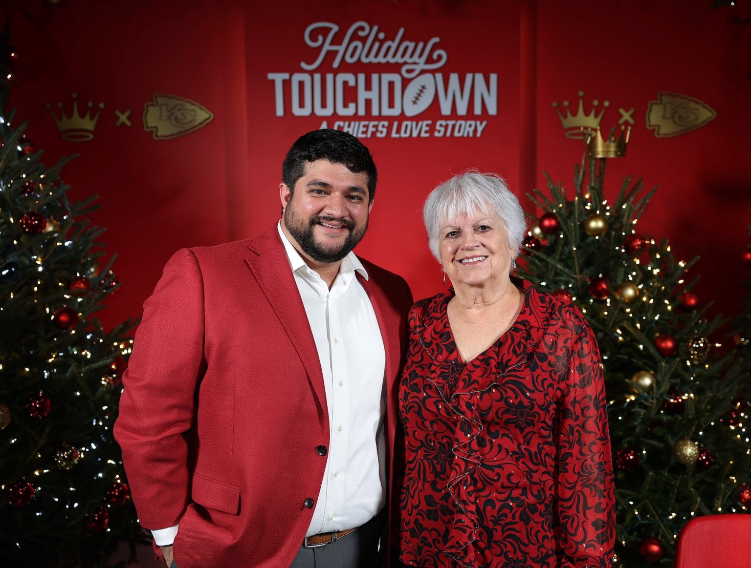 KANSAS CITY, MISSOURI - NOVEMBER 30: Chris Stathos (L) attend Hallmark's Premiere Screening of Holiday Touchdown: A Chiefs Love Story on November 30, 2024 in Kansas City, Missouri. (Photo by David Eulitt/Getty Images for Hallmark Media)