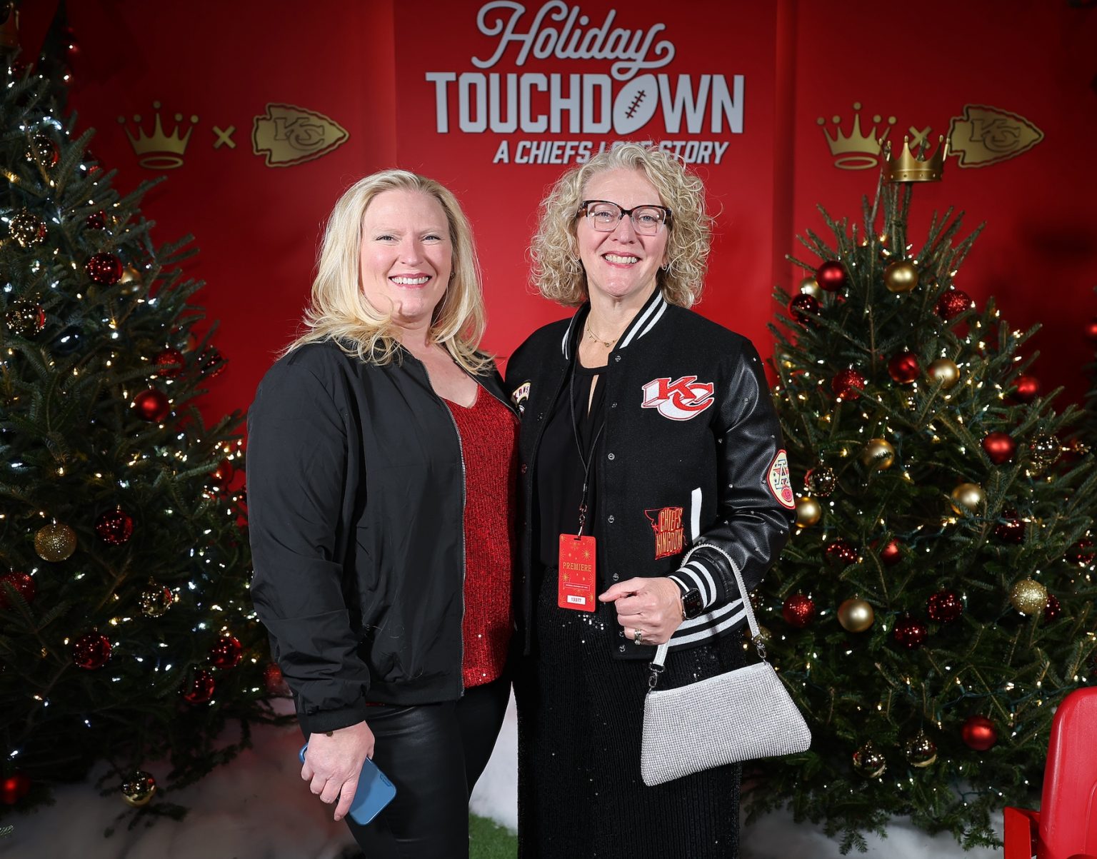 KANSAS CITY, MISSOURI - NOVEMBER 30: (L-R) Stefanie Werths and Stacey Paine attend Hallmark's Premiere Screening of Holiday Touchdown: A Chiefs Love Story on November 30, 2024 in Kansas City, Missouri. (Photo by David Eulitt/Getty Images for Hallmark Media)