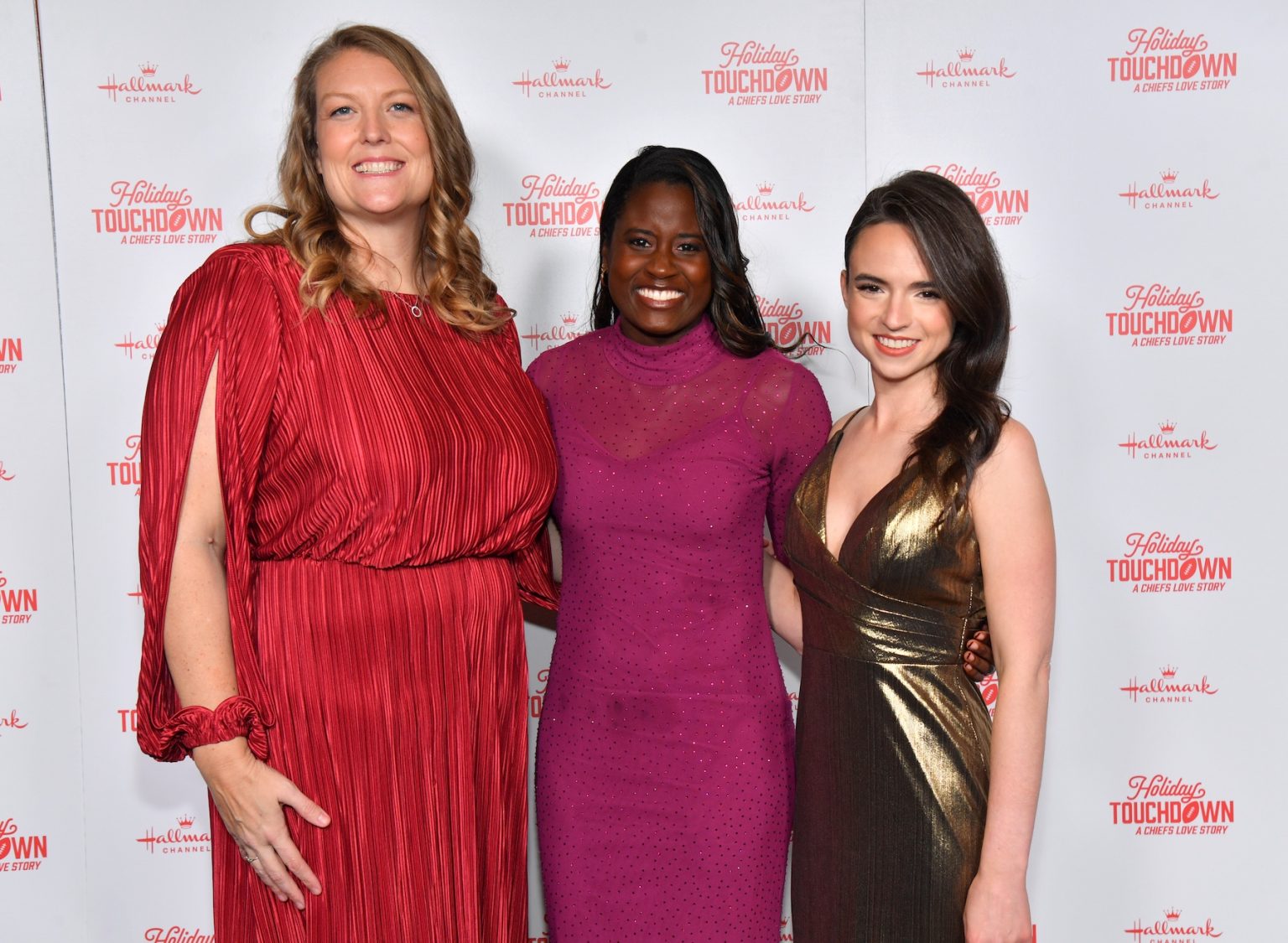 KANSAS CITY, MISSOURI - NOVEMBER 30: (L-R) Jennifer Kramer, Tatiana Erasme, and Candice Dilavore attend Hallmark's Premiere Screening of Holiday Touchdown: A Chiefs Love Story on November 30, 2024 in Kansas City, Missouri. (Photo by Jason Davis/Getty Images for Hallmark Media)