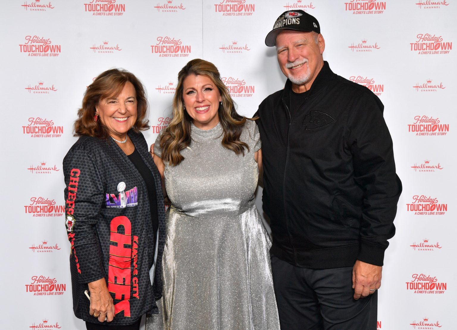 KANSAS CITY, MISSOURI - NOVEMBER 30: Samantha DiPippo (C) and Don Blalock (R) attend Hallmark's Premiere Screening of Holiday Touchdown: A Chiefs Love Story on November 30, 2024 in Kansas City, Missouri. (Photo by Jason Davis/Getty Images for Hallmark Media)