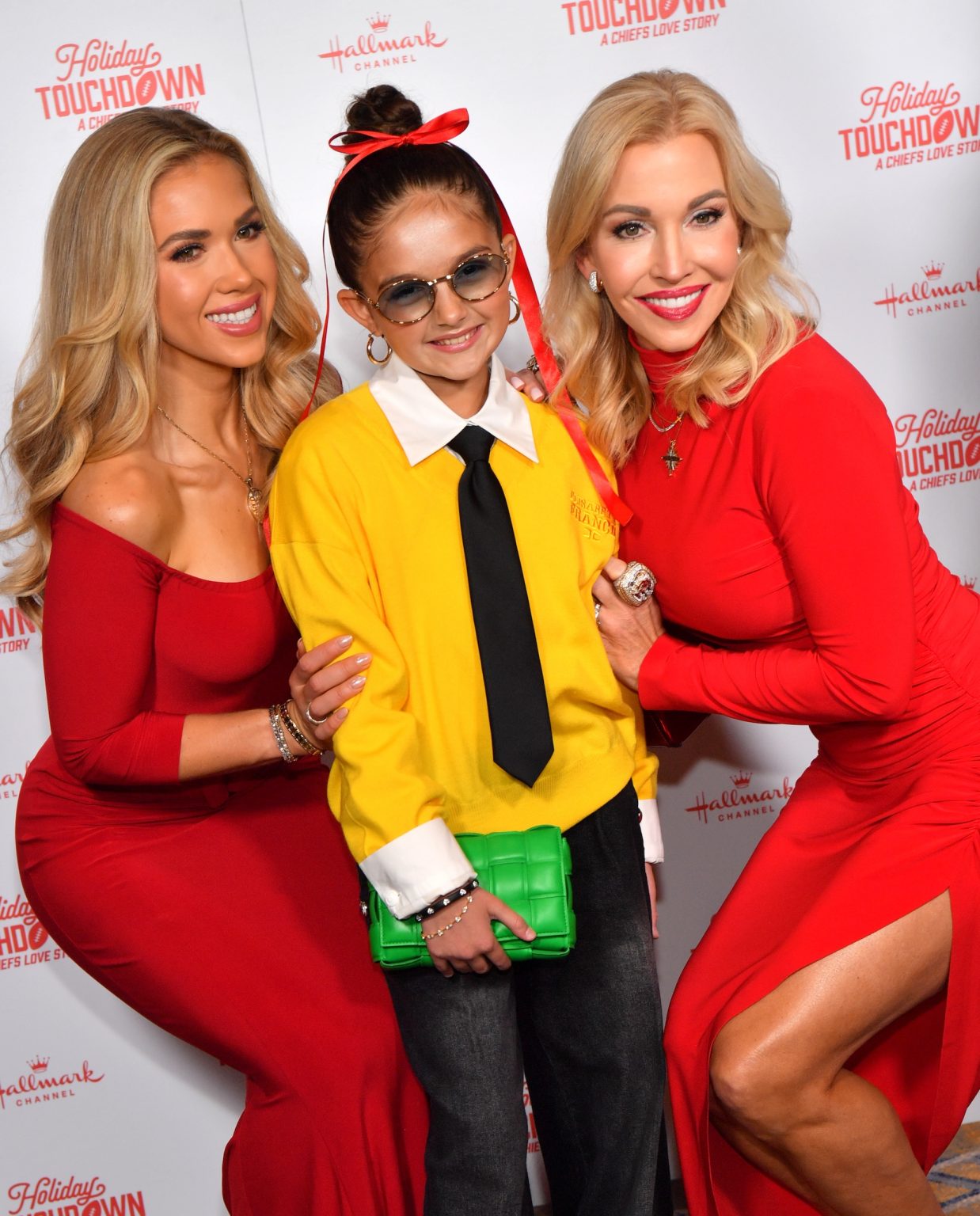 KANSAS CITY, MISSOURI - NOVEMBER 30: (L-R) Gracie Hunt Taylen Biggs, and Tavia Hunt attend Hallmark's Premiere Screening of Holiday Touchdown: A Chiefs Love Story on November 30, 2024 in Kansas City, Missouri. (Photo by Jason Davis/Getty Images for Hallmark Media)