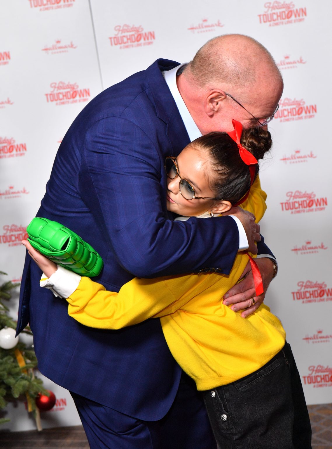 KANSAS CITY, MISSOURI - NOVEMBER 30: (L-R) Andy Reid and Taylen Biggs attend Hallmark's Premiere Screening of Holiday Touchdown: A Chiefs Love Story on November 30, 2024 in Kansas City, Missouri. (Photo by Jason Davis/Getty Images for Hallmark Media)