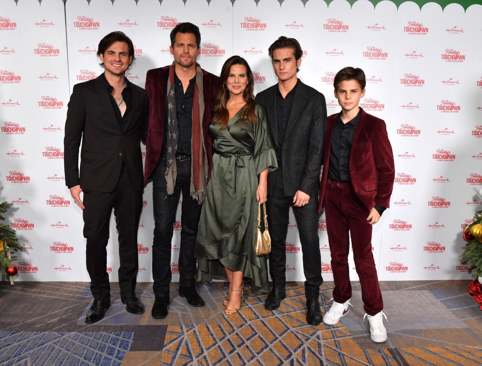 KANSAS CITY, MISSOURI - NOVEMBER 30: (L-R) Caleb Polaha, Kristoffer Polaha, Julianne Polaha, Micah Max Polaha, and Jude Polaha attend the Hallmark's Premiere Screening of Holiday Touchdown: A Chiefs Love Story on November 30, 2024 in Kansas City, Missouri. (Photo by Jason Davis/Getty Images for Hallmark Media)