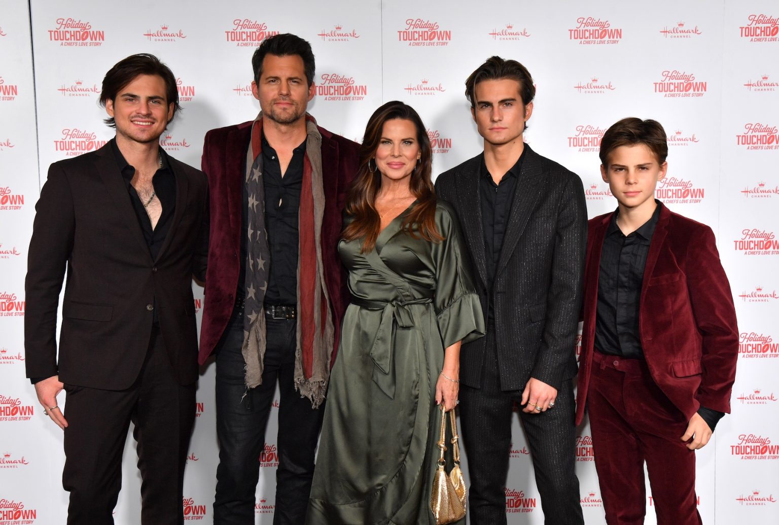 KANSAS CITY, MISSOURI - NOVEMBER 30: (L-R) Caleb Polaha, Kristoffer Polaha, Julianne Polaha, Micah Max Polaha, and Jude Polaha attend the Hallmark's Premiere Screening of Holiday Touchdown: A Chiefs Love Story on November 30, 2024 in Kansas City, Missouri. (Photo by Jason Davis/Getty Images for Hallmark Media)