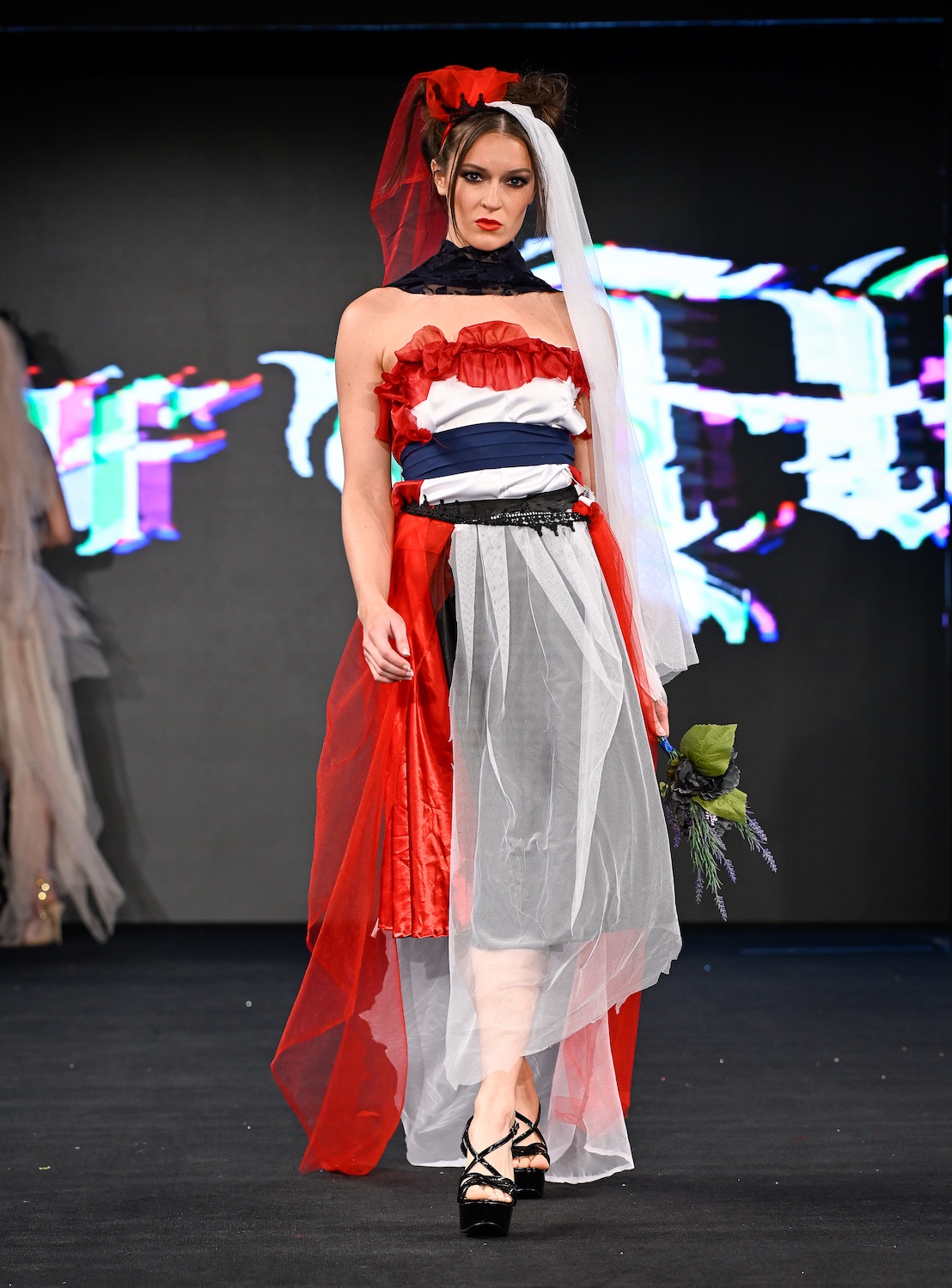 NEW YORK, NEW YORK - FEBRUARY 08: A model walks the runway at the Haus of Harleen show during New York Fashion Week Powered By Art Hearts Fashion at The Angel Orensanz Foundation on February 08, 2025 in New York City. (Photo by Arun Nevader/Getty Images for Art Hearts Fashion)