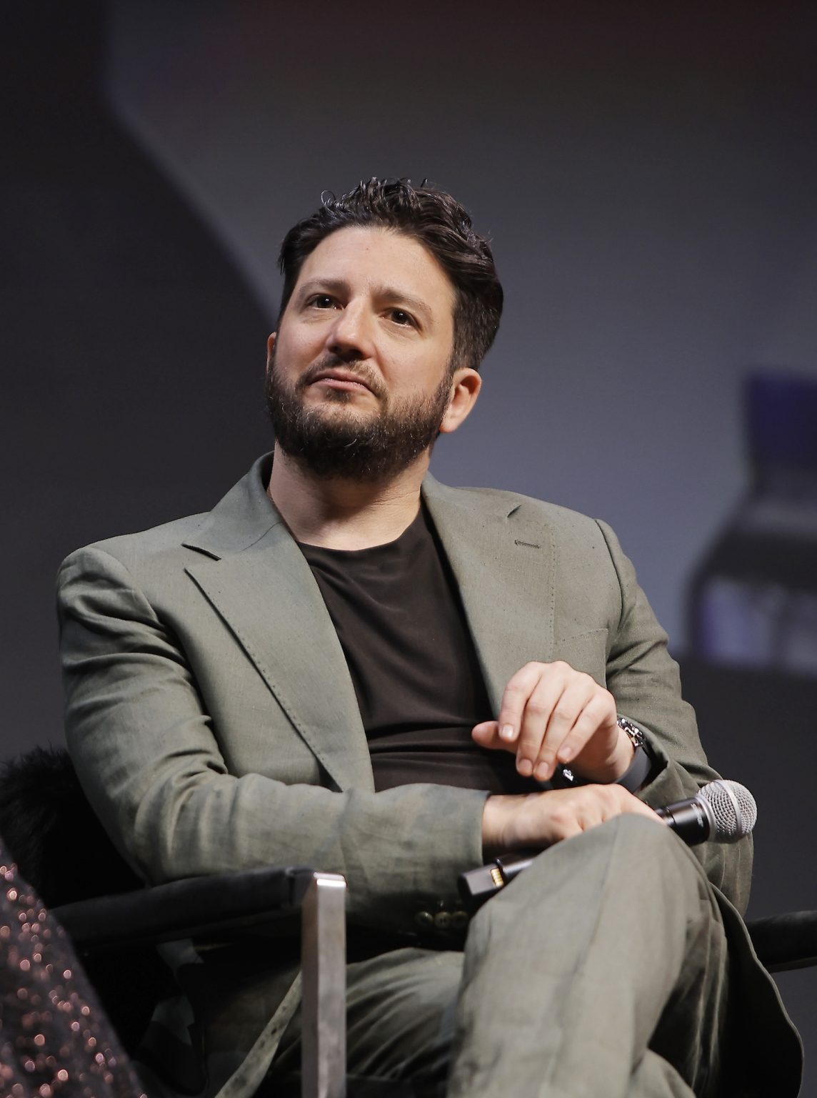 SANTA BARBARA, CALIFORNIA - FEBRUARY 09: John Magaro speaks onstage at the Virtuosos Award during the 40th Santa Barbara International Film Festival at The Arlington Theatre on February 09, 2025 in Santa Barbara, California. (Photo by Tibrina Hobson/Getty Images for Santa Barbara International Film Festival)