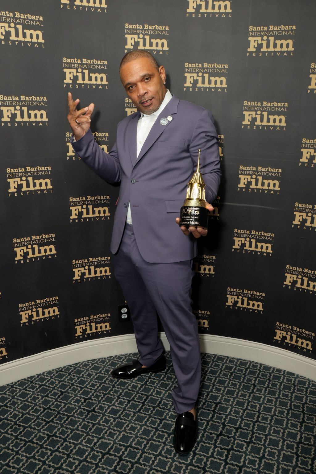 SANTA BARBARA, CALIFORNIA - FEBRUARY 09: Honoree Clarence Maclin poses with the Virtuosos Award during the 40th Santa Barbara International Film Festival at The Arlington Theatre on February 09, 2025 in Santa Barbara, California. (Photo by Rebecca Sapp/Getty Images for Santa Barbara International Film Festival)
