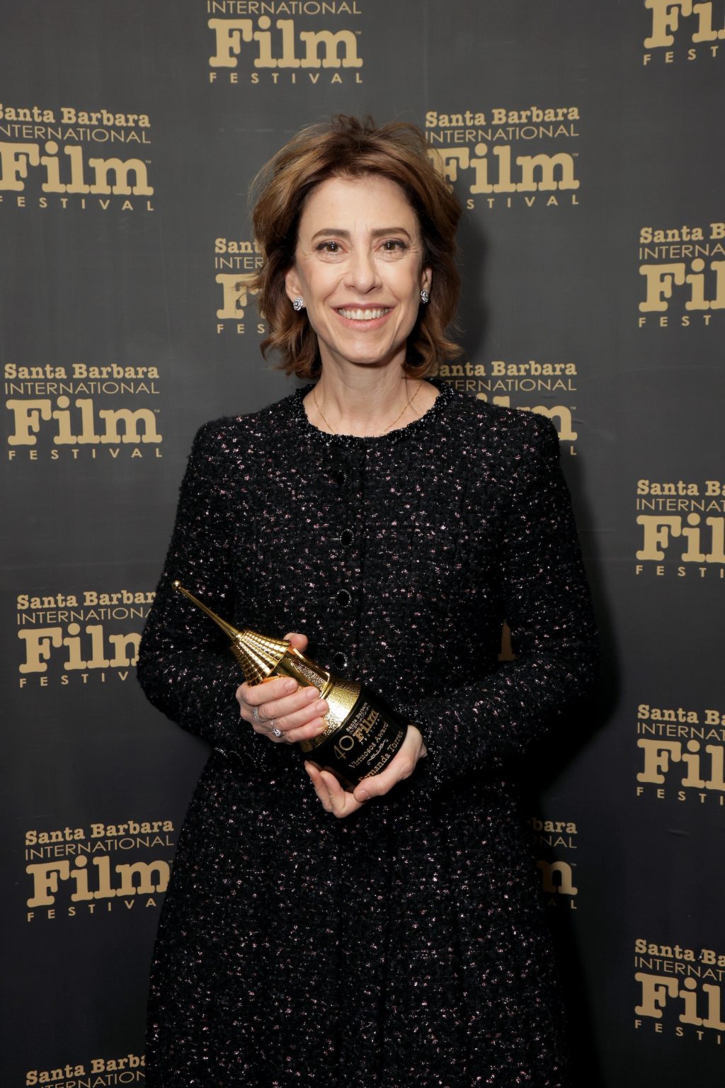 SANTA BARBARA, CALIFORNIA - FEBRUARY 09: Honoree Fernanda Torres poses with the Virtuosos Award during the 40th Santa Barbara International Film Festival at The Arlington Theatre on February 09, 2025 in Santa Barbara, California. (Photo by Rebecca Sapp/Getty Images for Santa Barbara International Film Festival)