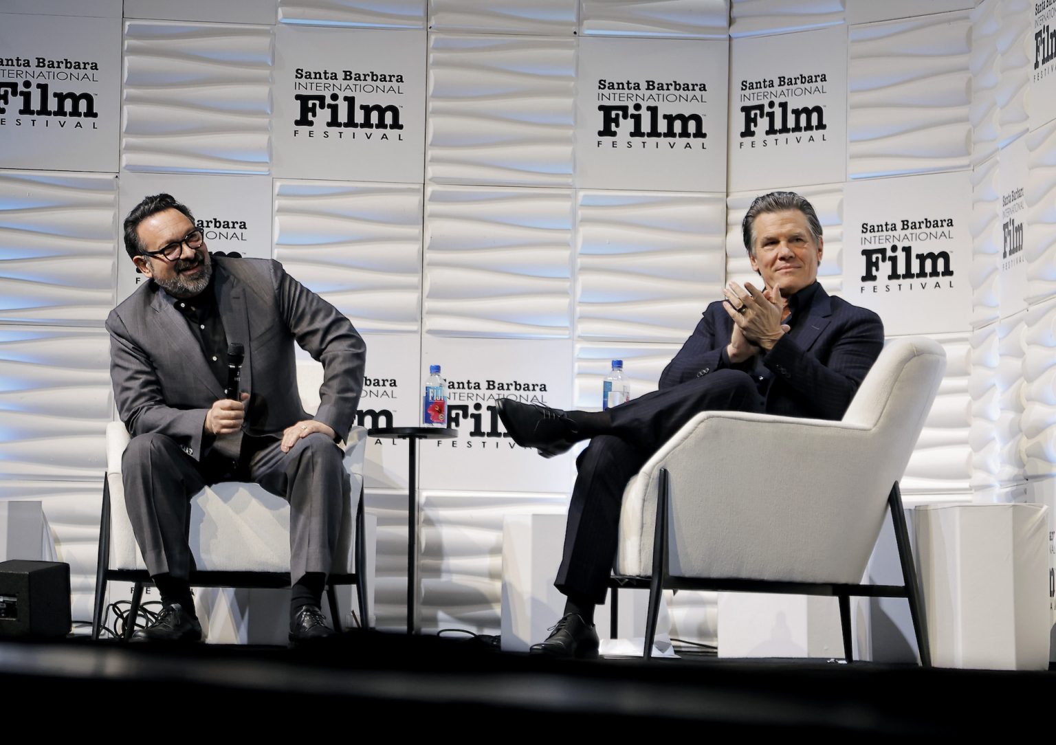 SANTA BARBARA, CALIFORNIA - FEBRUARY 11: James Mangold and Josh Brolin speak onstage at the Arlington Artist Award ceremony during the 40th Santa Barbara International Film Festival at The Arlington Theatre on February 11, 2025 in Santa Barbara, California. (Photo by Tibrina Hobson/Getty Images for Santa Barbara International Film Festival)