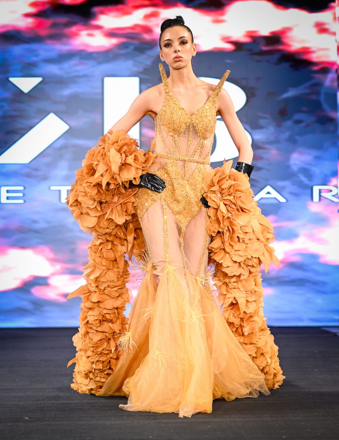 NEW YORK, NEW YORK - FEBRUARY 06: A model walks the runway at the Kenneth Barlis show during New York Fashion Week Powered By Art Hearts Fashion at The Angel Orensanz Foundation on February 06, 2025 in New York City. (Photo by Arun Nevader/Getty Images for Art Hearts Fashion)