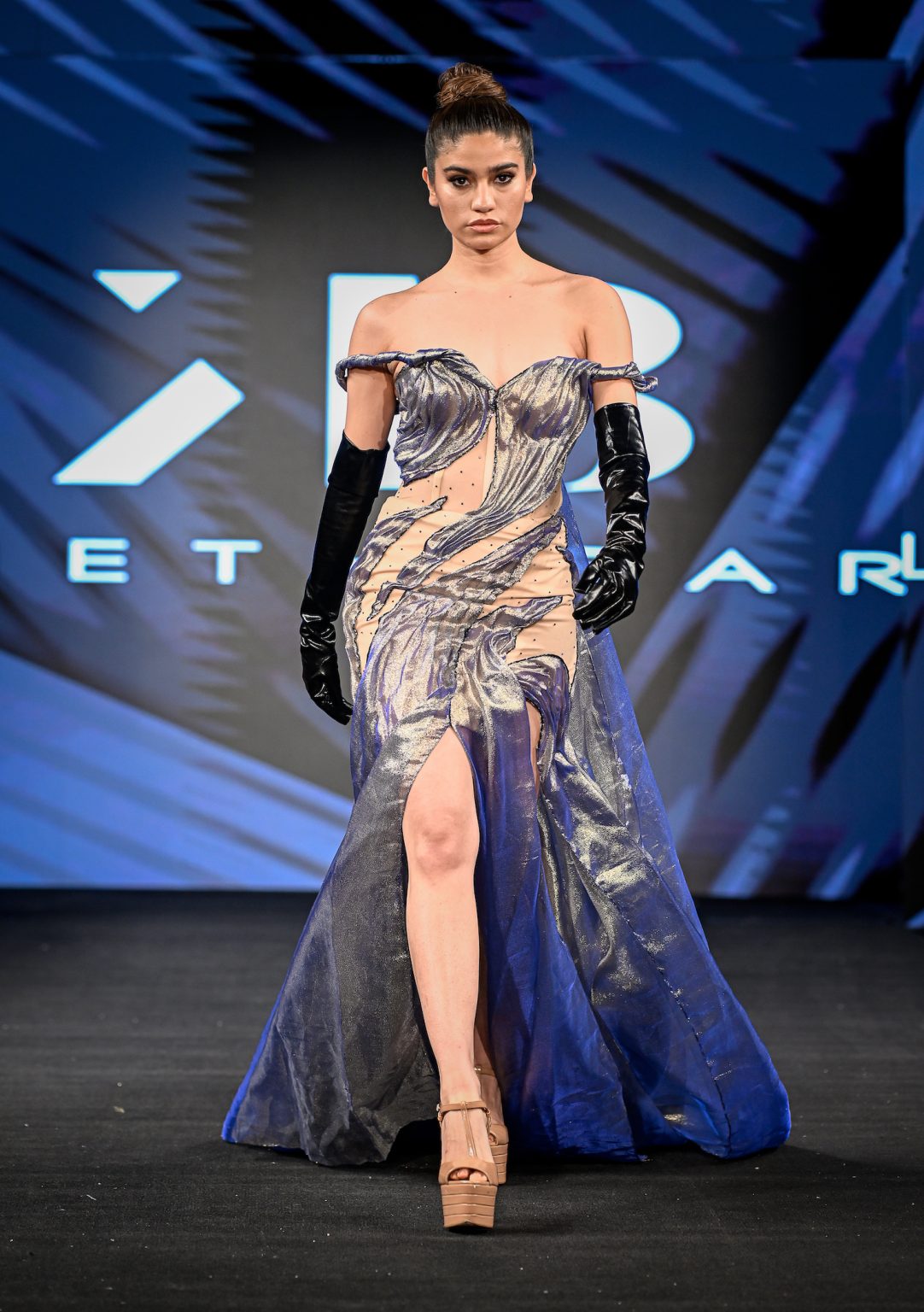 NEW YORK, NEW YORK - FEBRUARY 06: A model walks the runway at the Kenneth Barlis show during New York Fashion Week Powered By Art Hearts Fashion at The Angel Orensanz Foundation on February 06, 2025 in New York City. (Photo by Arun Nevader/Getty Images for Art Hearts Fashion)
