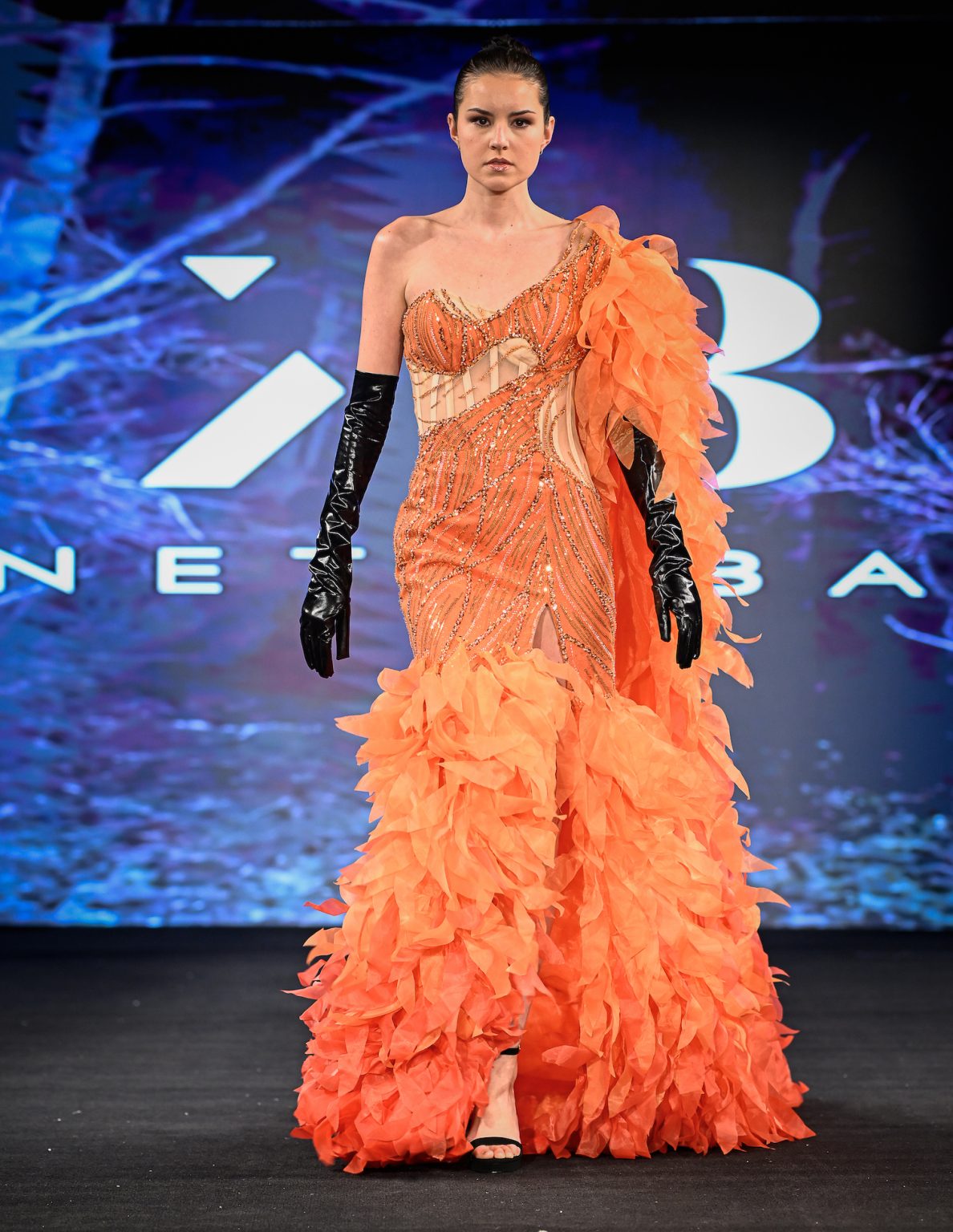 NEW YORK, NEW YORK - FEBRUARY 06: A model walks the runway at the Kenneth Barlis show during New York Fashion Week Powered By Art Hearts Fashion at The Angel Orensanz Foundation on February 06, 2025 in New York City. (Photo by Arun Nevader/Getty Images for Art Hearts Fashion)