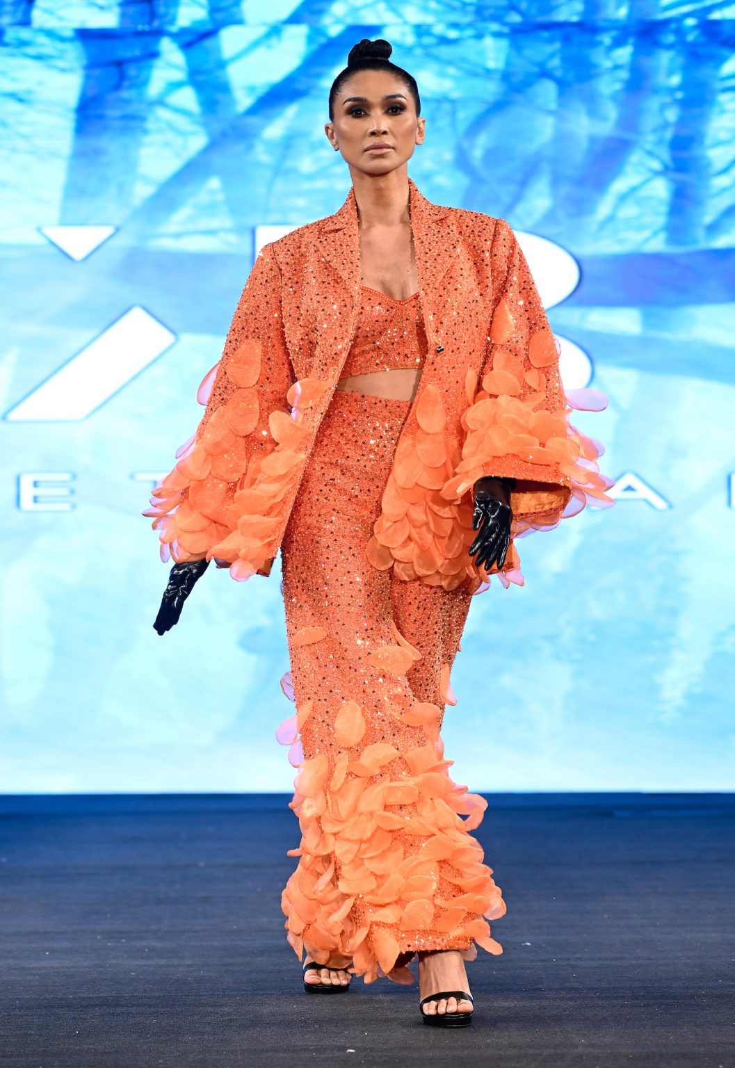 NEW YORK, NEW YORK - FEBRUARY 06: A model walks the runway at the Kenneth Barlis show during New York Fashion Week Powered By Art Hearts Fashion at The Angel Orensanz Foundation on February 06, 2025 in New York City. (Photo by Arun Nevader/Getty Images for Art Hearts Fashion)