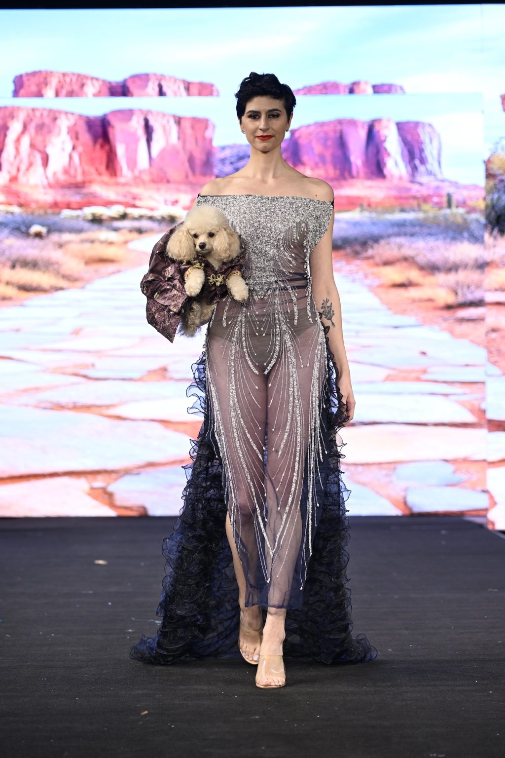 NEW YORK, NEW YORK - FEBRUARY 08: Gena Dickon walks the runway at the Anthony Rubio show during New York Fashion Week Powered By Art Hearts Fashion at The Angel Orensanz Foundation on February 08, 2025 in New York City. (Photo by Arun Nevader/Getty Images for Art Hearts Fashion)
