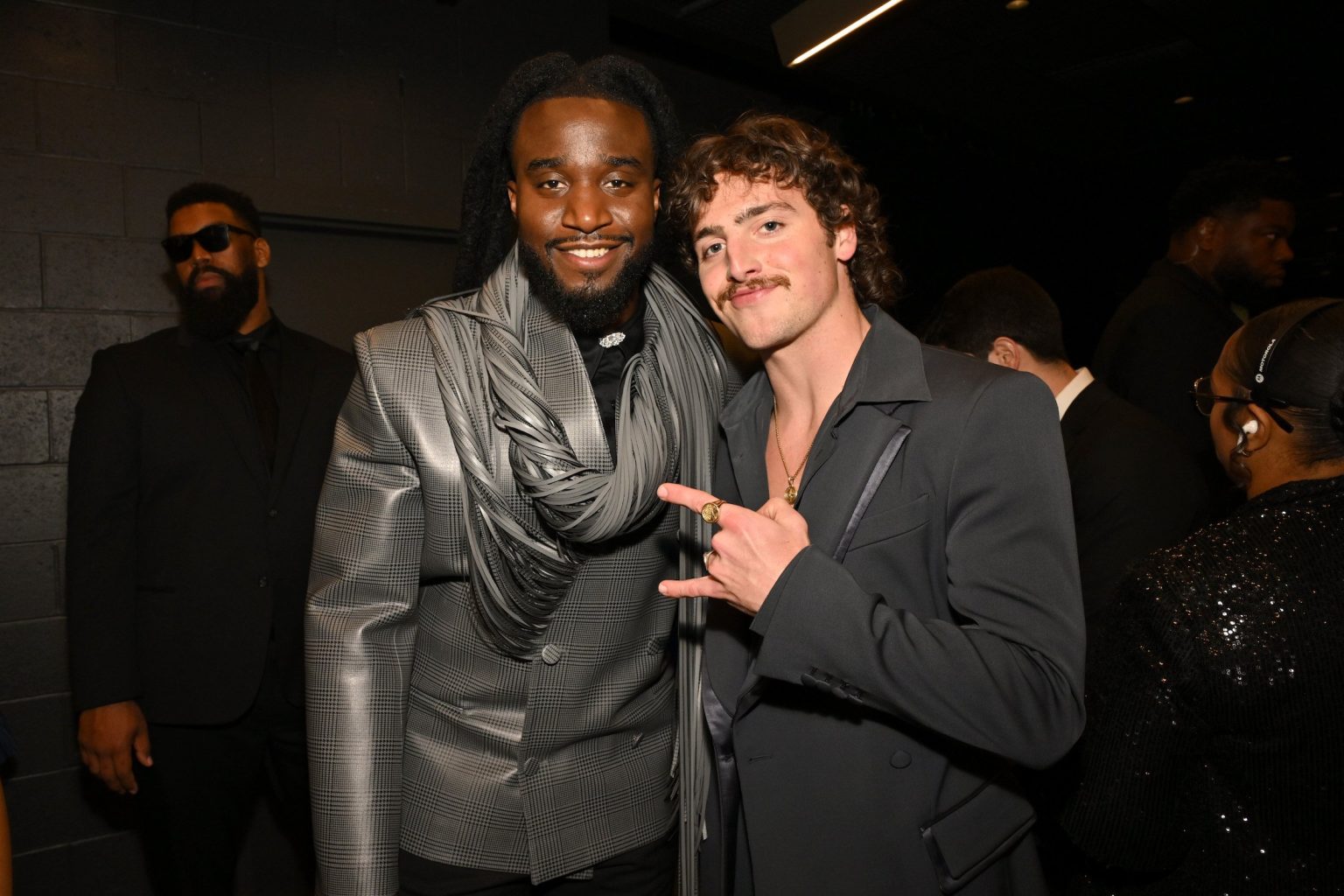LOS ANGELES, CALIFORNIA - FEBRUARY 02: (L-R) Shaboozey and Benson Boone attend the 67th Annual GRAMMY Awards at Crypto.com Arena on February 02, 2025 in Los Angeles, California. (Photo by Lester Cohen/Getty Images for The Recording Academy)