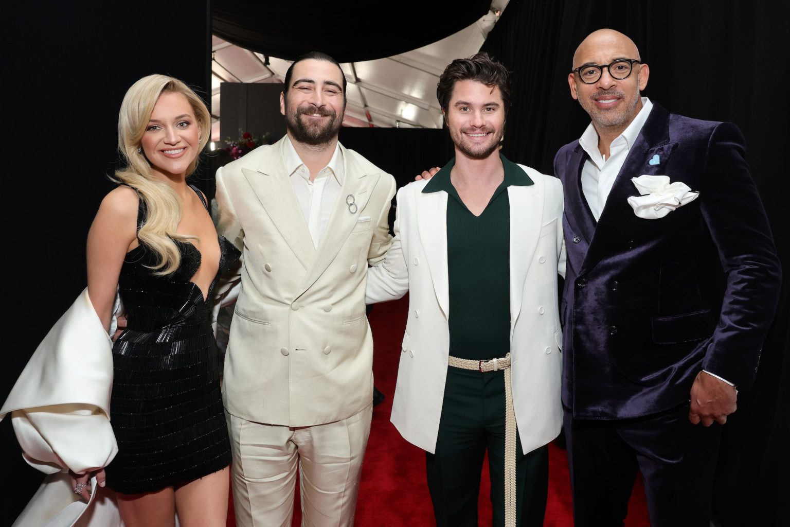 LOS ANGELES, CALIFORNIA - FEBRUARY 02: (L-R) Kelsea Ballerini, Noah Kahan, Chase Stokes and Harvey Mason jr., CEO, MusicCares & Recording Academy attend the 67th Annual GRAMMY Awards at Crypto.com Arena on February 02, 2025 in Los Angeles, California. (Photo by Emma McIntyre/Getty Images for The Recording Academy)