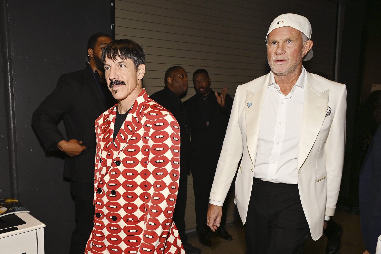 LOS ANGELES, CALIFORNIA - FEBRUARY 02: (L-R) Anthony Kiedis and Chad Smith attend the 67th Annual GRAMMY Awards at Crypto.com Arena on February 02, 2025 in Los Angeles, California. (Photo by Lester Cohen/Getty Images for The Recording Academy)