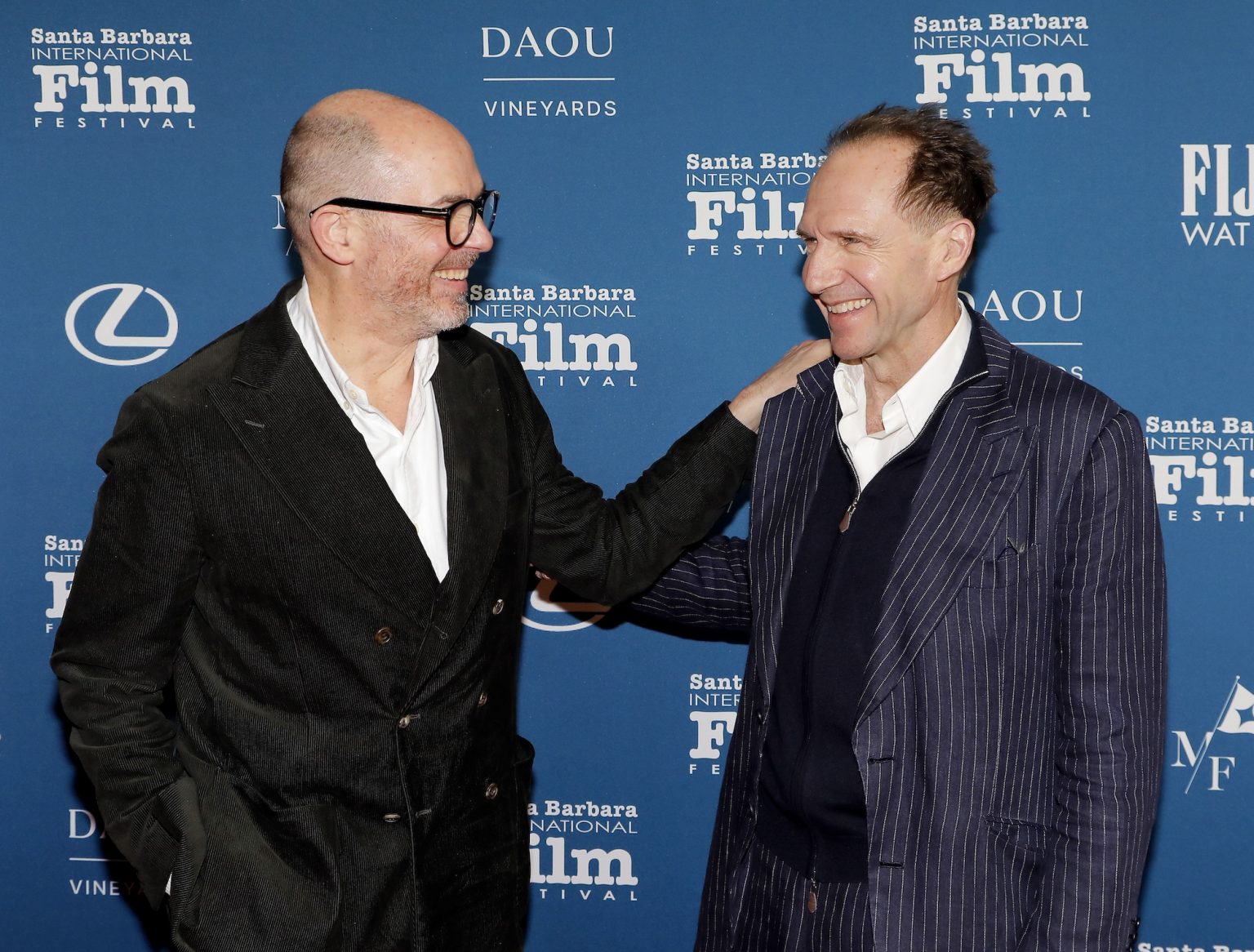 SANTA BARBARA, CALIFORNIA - FEBRUARY 06: Edward Berger and honoree Ralph Fiennes attends the Outstanding Performer of the Year Award ceremony during the 40th Santa Barbara International Film Festival at Arlington Theatre on February 06, 2025 in Santa Barbara, California. (Photo by Tibrina Hobson/Getty Images for Santa Barbara International Film Festival)
