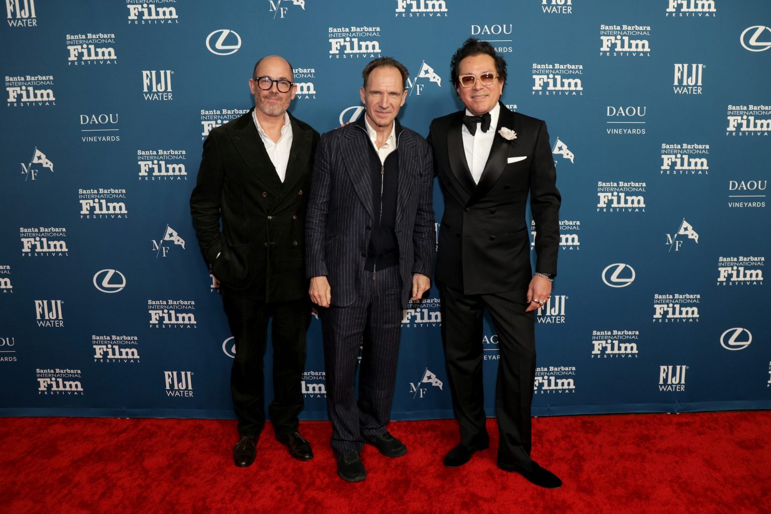 SANTA BARBARA, CALIFORNIA - FEBRUARY 06: (L-R) Edward Berger, honoree Ralph Fiennes, and SBIFF Executive Director Roger Durling attend the Outstanding Performer of the Year Award ceremony during the 40th Santa Barbara International Film Festival at Arlington Theatre on February 06, 2025 in Santa Barbara, California. (Photo by Rebecca Sapp/Getty Images for Santa Barbara International Film Festival)