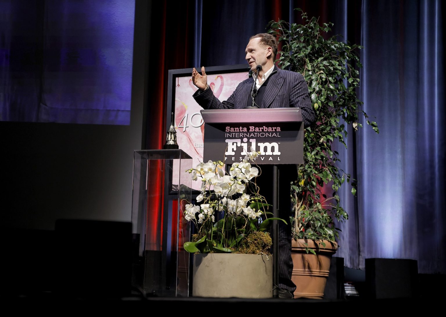 SANTA BARBARA, CALIFORNIA - FEBRUARY 06: Honoree Ralph Fiennes receives the Outstanding Performer of the Year Award ceremony during the 40th Santa Barbara International Film Festival at Arlington Theatre on February 06, 2025 in Santa Barbara, California. (Photo by Tibrina Hobson/Getty Images for Santa Barbara International Film Festival)
