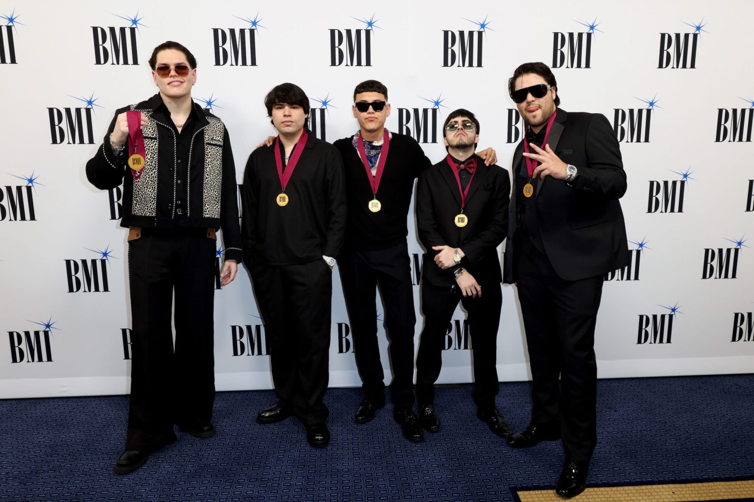MIAMI, FLORIDA - MARCH 06: (L-R) Miguel Armenta "Armenta", Angel Ureta, Juanpa Salazar, Jonathan Caro and Daniel Gutierrez attend the BMI Latin Awards on March 06, 2025 in Miami, Florida. (Photo by Alexander Tamargo/Getty Images for BMI)