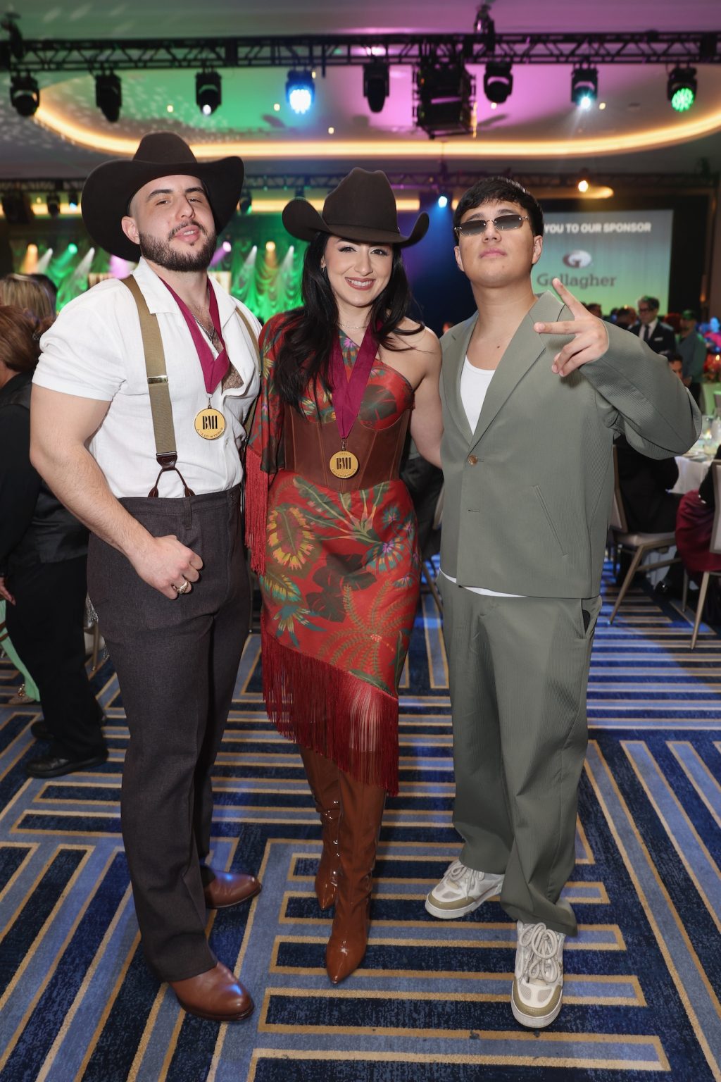 MIAMI, FLORIDA - MARCH 06: (L-R) José Esparza, Angélica Gallegos and Alex Favela attend the BMI Latin Awards on March 06, 2025 in Miami, Florida. (Photo by Rodrigo Varela/Getty Images for BMI)