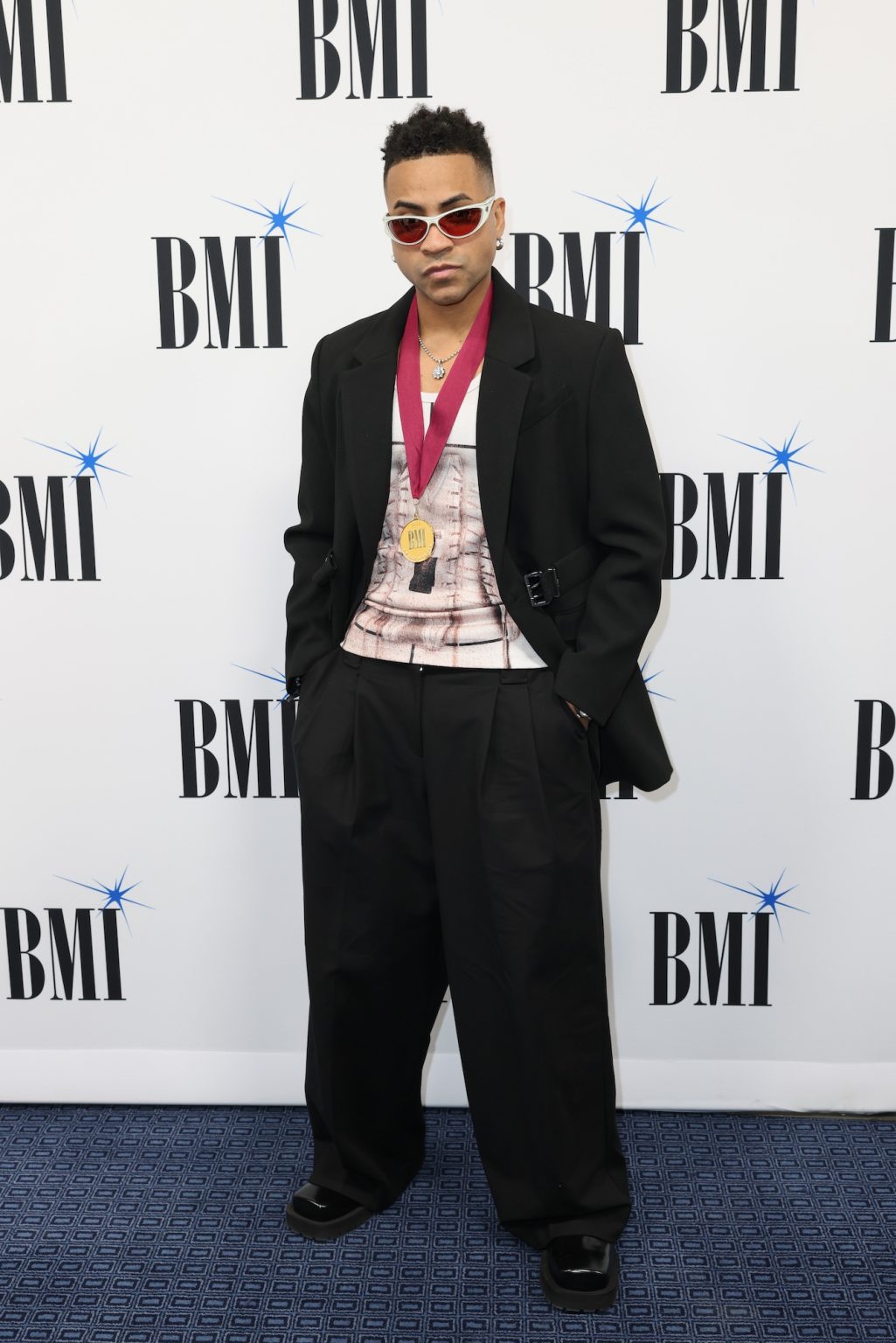 MIAMI, FLORIDA - MARCH 06: Caleb Calloway attends the BMI Latin Awards on March 06, 2025 in Miami, Florida. (Photo by Alexander Tamargo/Getty Images for BMI)