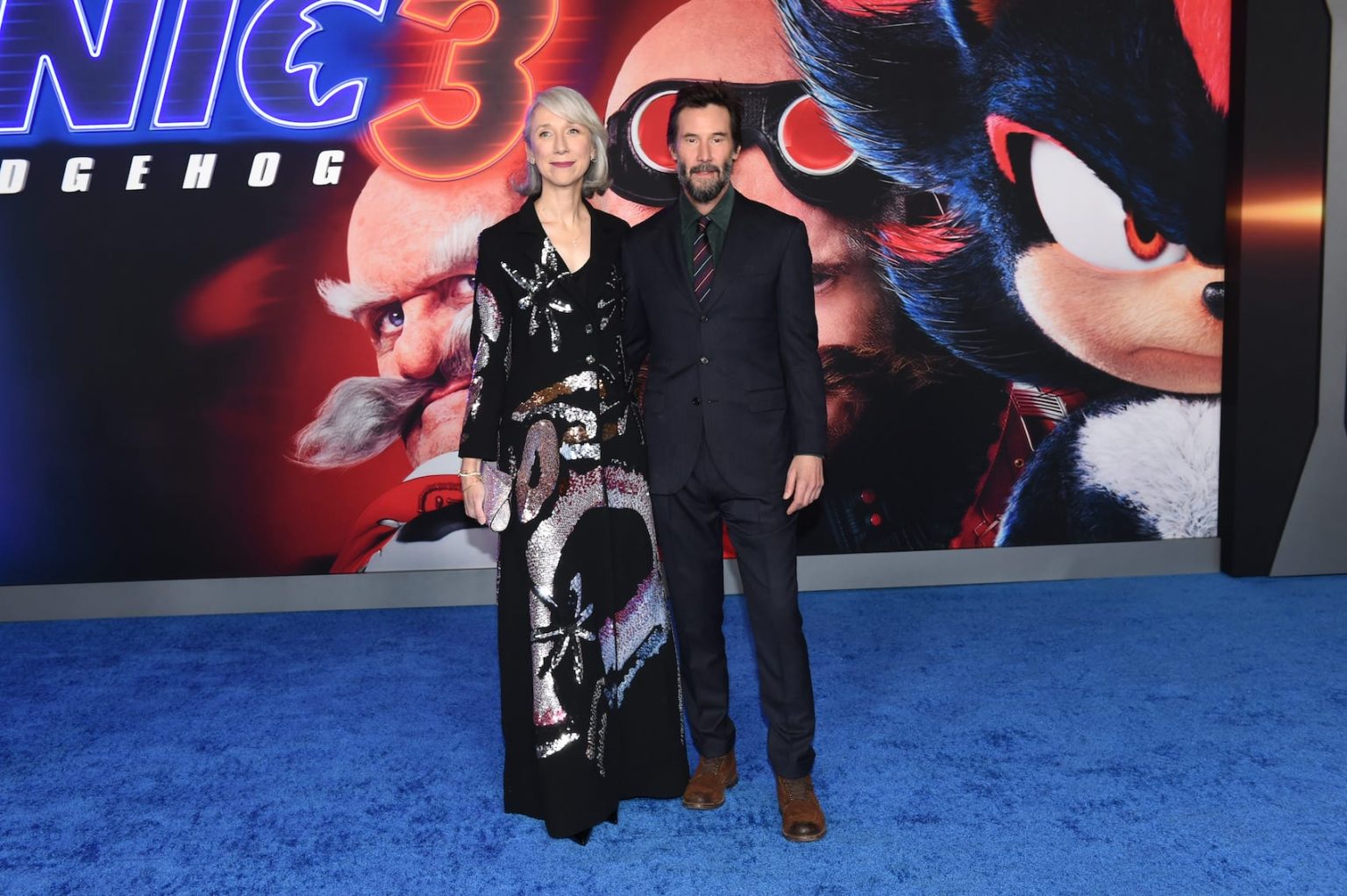 HOLLYWOOD, CALIFORNIA - DECEMBER 16: (L-R) Alexandra Grant and Keanu Reeves attend the "Sonic The Hedgehog 3" Los Angeles premiere at the TCL Chinese Theatre on December 16, 2024, in Hollywood, California. (Photo by Vivien Killilea/Getty Images for Paramount Pictures)