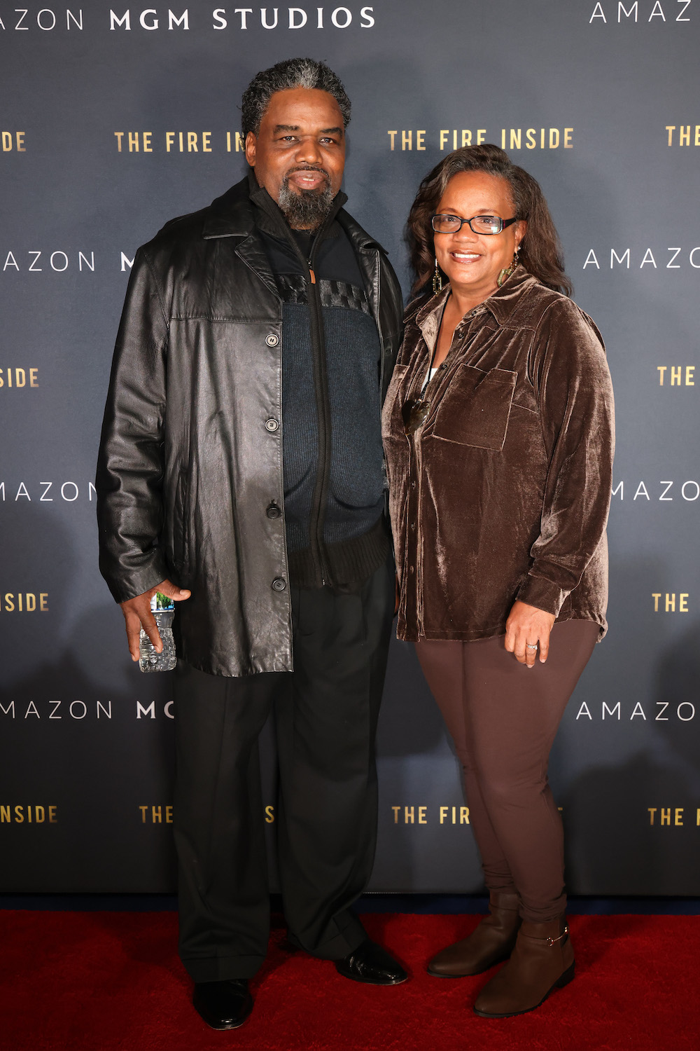 FLINT, MICHIGAN - NOVEMBER 10: (L-R) Jason Crutchfield and guest attend The Fire Inside – Flint Community Screening at Cinemark Flint West on November 10, 2024 in Flint, Michigan. (Photo by Scott Legato/Getty Images for The Fire Inside)