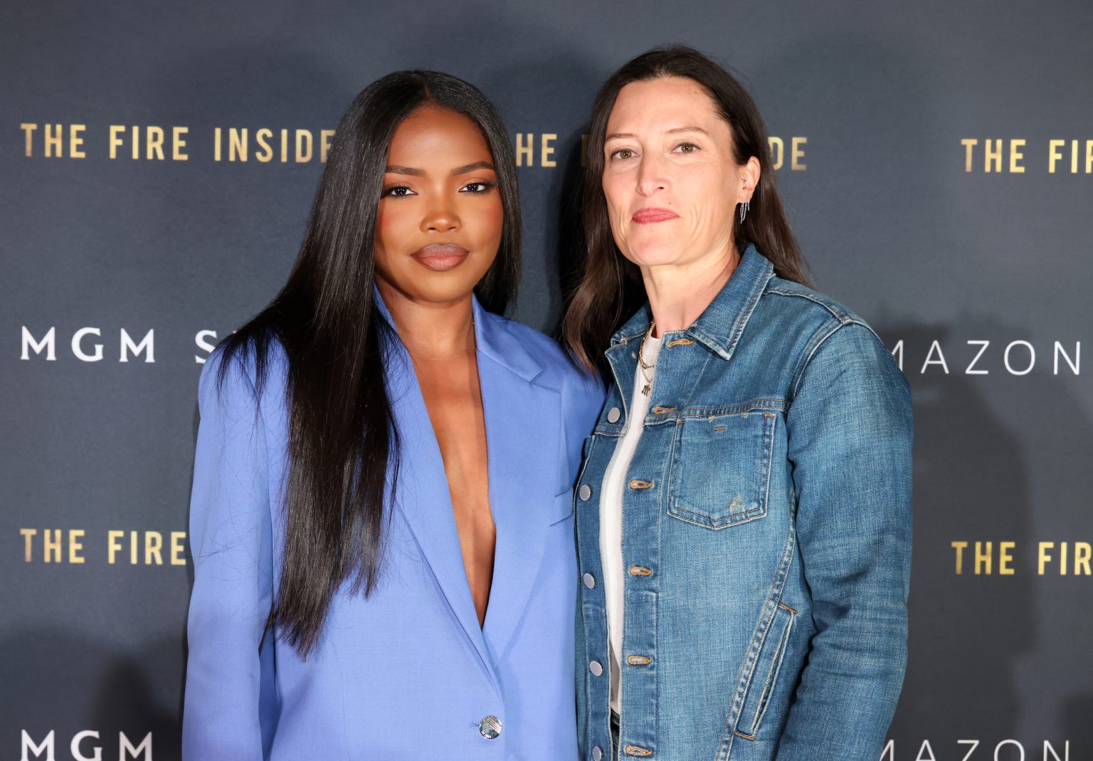 FLINT, MICHIGAN - NOVEMBER 10: (L-R) Ryan Destiny and Rachel Morrison attend The Fire Inside – Flint Community Screening at Cinemark Flint West on November 10, 2024 in Flint, Michigan. (Photo by Scott Legato/Getty Images for The Fire Inside)