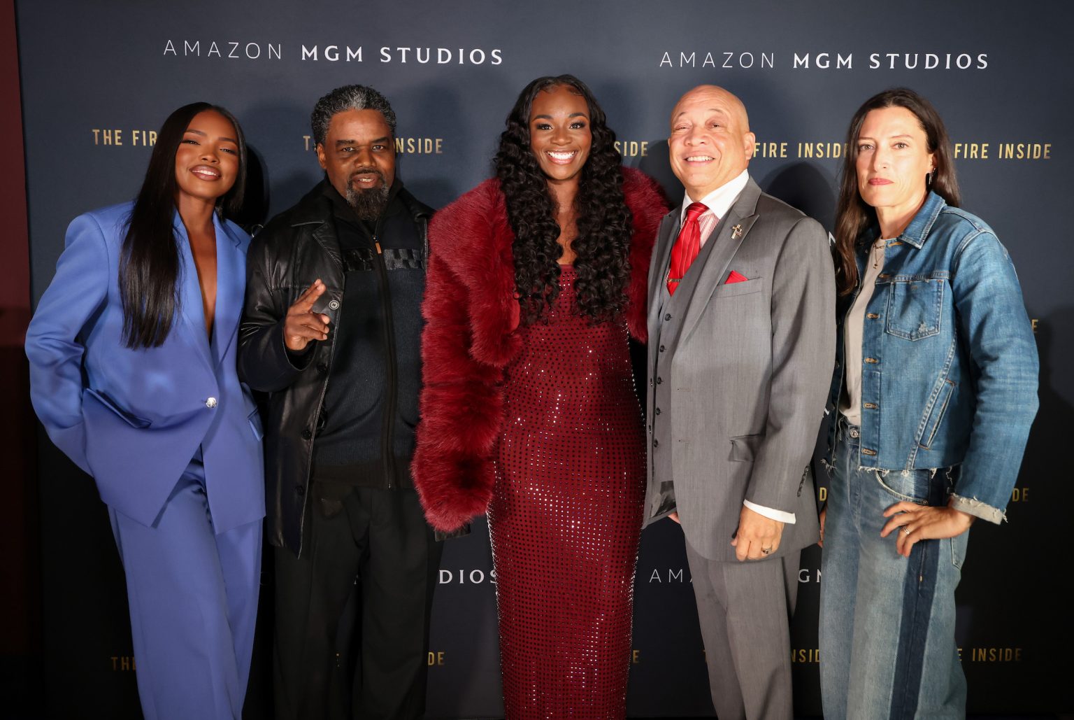 FLINT, MICHIGAN - NOVEMBER 10: (L-R) Ryan Destiny, Jason Crutchfield, Claressa Shields, Mayor of Flint, MI, Sheldon Neeley, and Rachel Morrison attend The Fire Inside – Flint Community Screening at Cinemark Flint West on November 10, 2024 in Flint, Michigan. (Photo by Scott Legato/Getty Images for The Fire Inside)