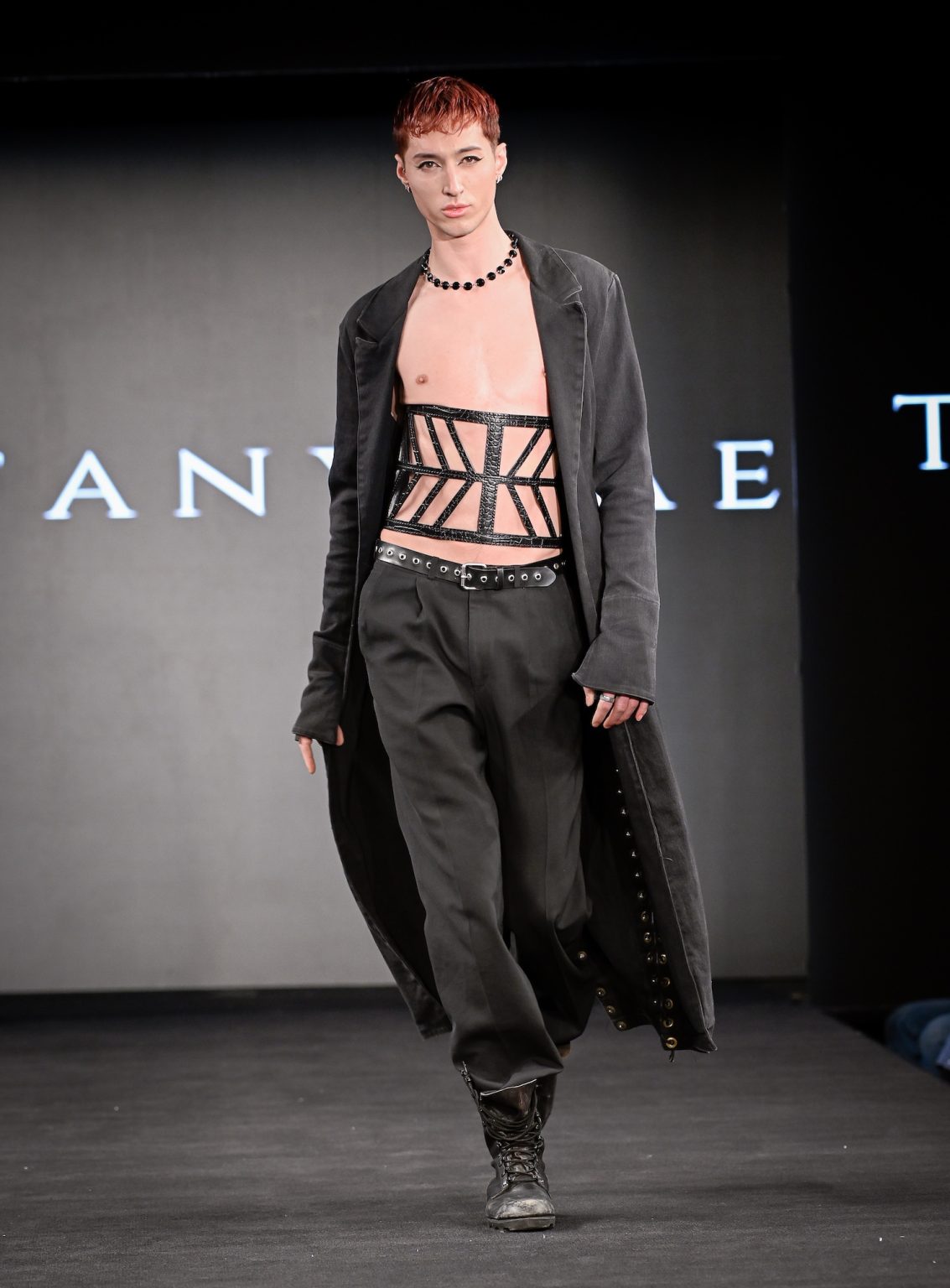 NEW YORK, NEW YORK - FEBRUARY 07: Tyler Stone walks the runway at the Tiffany Rae show during New York Fashion Week Powered By Art Hearts Fashion at The Angel Orensanz Foundation on February 07, 2025 in New York City. (Photo by Arun Nevader/Getty Images for Art Hearts Fashion)