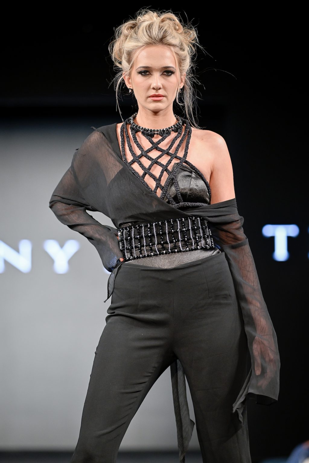 NEW YORK, NEW YORK - FEBRUARY 07: Abbey Christine walks the runway at the Tiffany Rae show during New York Fashion Week Powered By Art Hearts Fashion at The Angel Orensanz Foundation on February 07, 2025 in New York City. (Photo by Arun Nevader/Getty Images for Art Hearts Fashion)