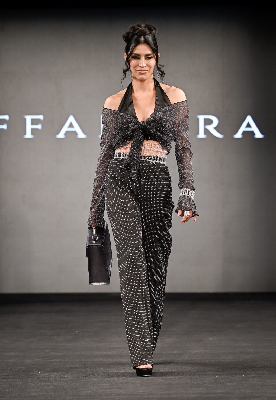 NEW YORK, NEW YORK - FEBRUARY 07: A model walks the runway at the Tiffany Rae show during New York Fashion Week Powered By Art Hearts Fashion at The Angel Orensanz Foundation on February 07, 2025 in New York City. (Photo by Arun Nevader/Getty Images for Art Hearts Fashion)
