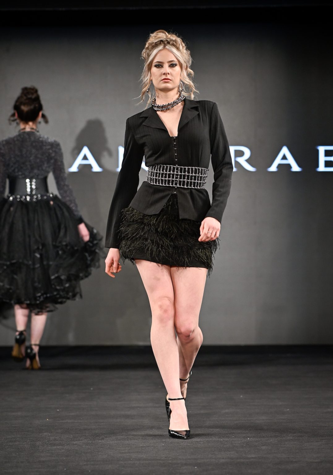 NEW YORK, NEW YORK - FEBRUARY 07: A model walks the runway at the Tiffany Rae show during New York Fashion Week Powered By Art Hearts Fashion at The Angel Orensanz Foundation on February 07, 2025 in New York City. (Photo by Arun Nevader/Getty Images for Art Hearts Fashion)