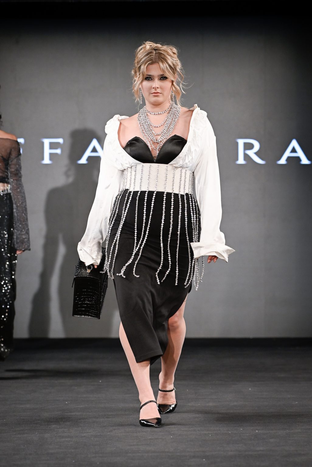 NEW YORK, NEW YORK - FEBRUARY 07: A model walks the runway at the Tiffany Rae show during New York Fashion Week Powered By Art Hearts Fashion at The Angel Orensanz Foundation on February 07, 2025 in New York City. (Photo by Arun Nevader/Getty Images for Art Hearts Fashion)