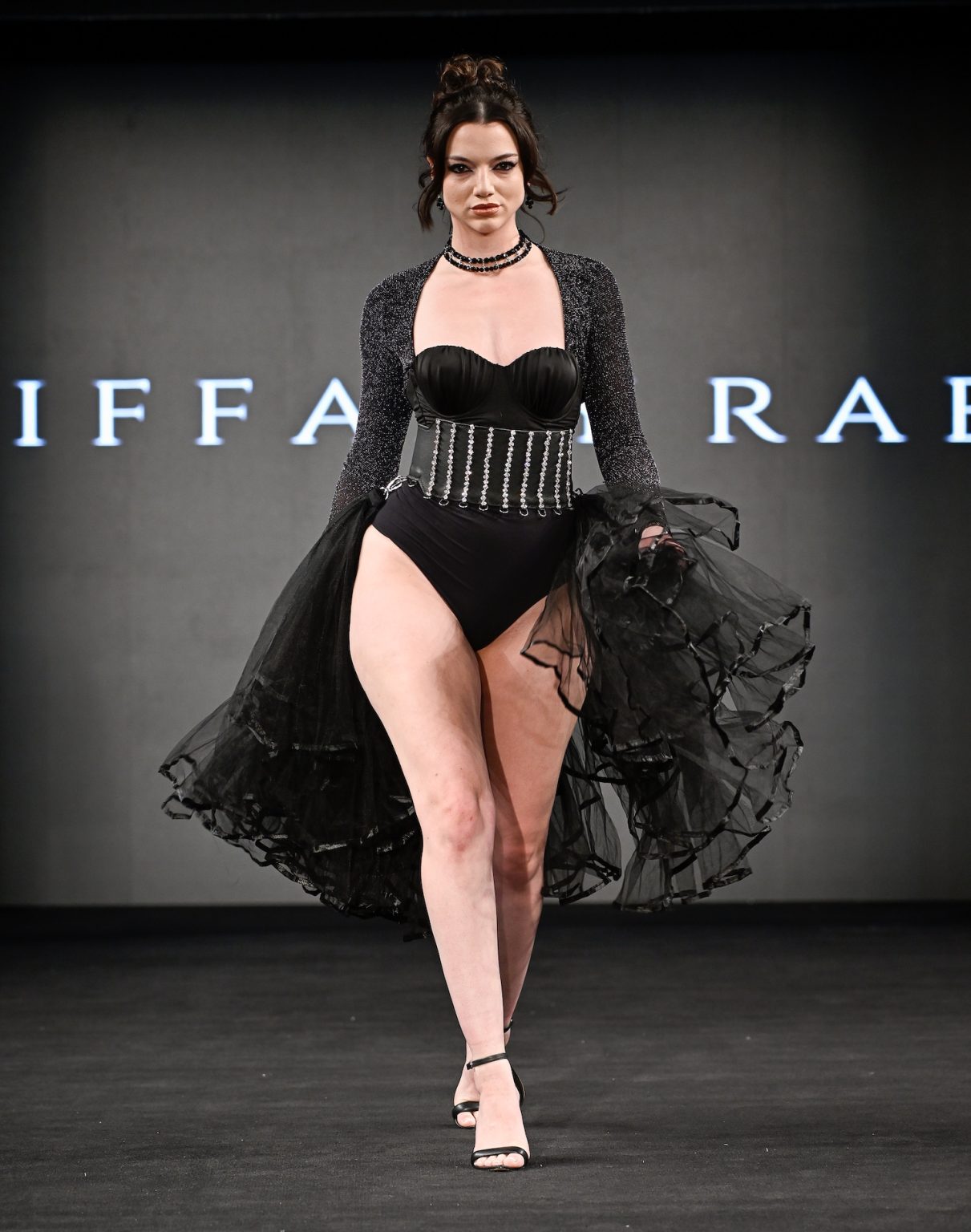 NEW YORK, NEW YORK - FEBRUARY 07: A model walks the runway at the Tiffany Rae show during New York Fashion Week Powered By Art Hearts Fashion at The Angel Orensanz Foundation on February 07, 2025 in New York City. (Photo by Arun Nevader/Getty Images for Art Hearts Fashion)