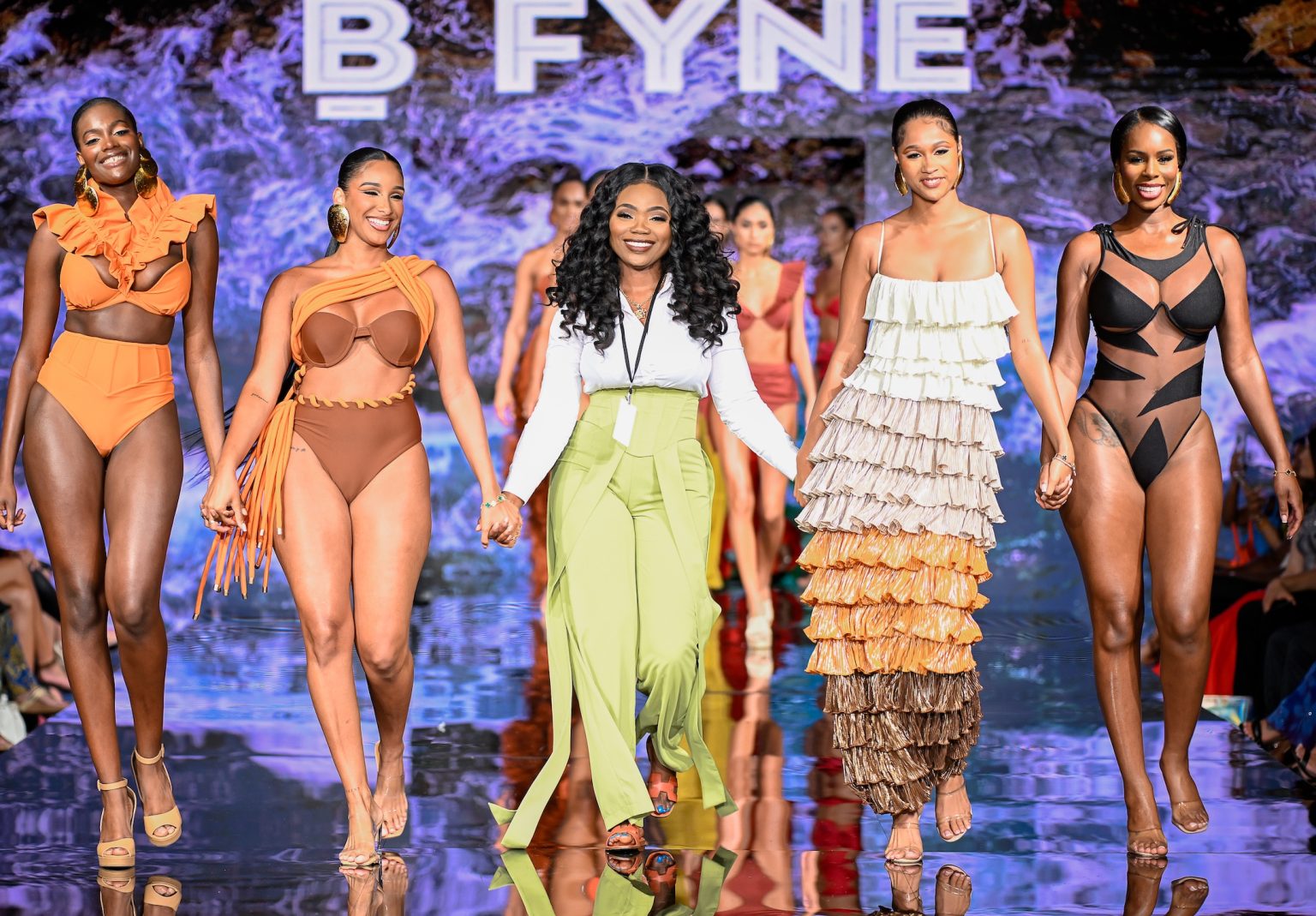 MIAMI BEACH, FLORIDA - MAY 31: Designer Buki Ade and models walks the runway at the BYFNE show during Miami Swim Week Powered By Art Hearts Fashion at Eden Roc Hotel on May 31, 2025 in Miami Beach, Florida. (Photo by Arun Nevader/Getty Images for Art Hearts Fashion)