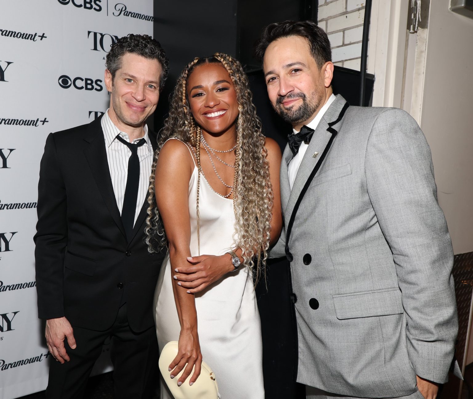 NEW YORK, NEW YORK - JUNE 08: (L-R) Thomas Kail, Ariana DeBose and Lin-Manuel Miranda attend The 78th Annual Tony Awards at Radio City Music Hall on June 08, 2025 in New York City. (Photo by Kevin Mazur/Getty Images for Tony Awards Productions)
