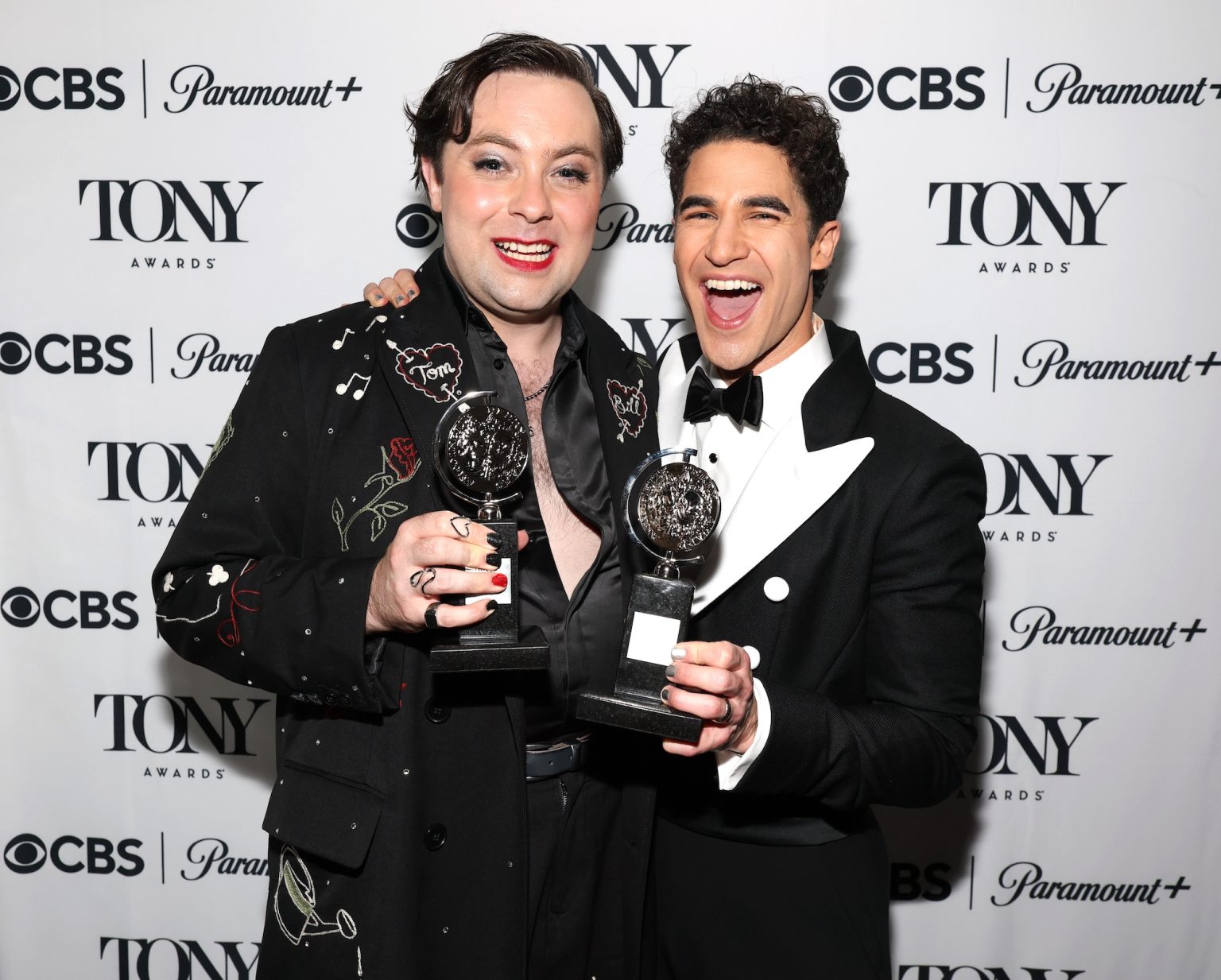 NEW YORK, NEW YORK - JUNE 08: Jak Malone, winner of the Featured Actor in a Musical award for "Operation Mincemeat", and Darren Criss, winner of the Best Performance by an Actor in a Leading Role in a Musical award for "Maybe Happy Ending," at The 78th Annual Tony Awards at Radio City Music Hall on June 08, 2025 in New York City. (Photo by Kevin Mazur/Getty Images for Tony Awards Productions)