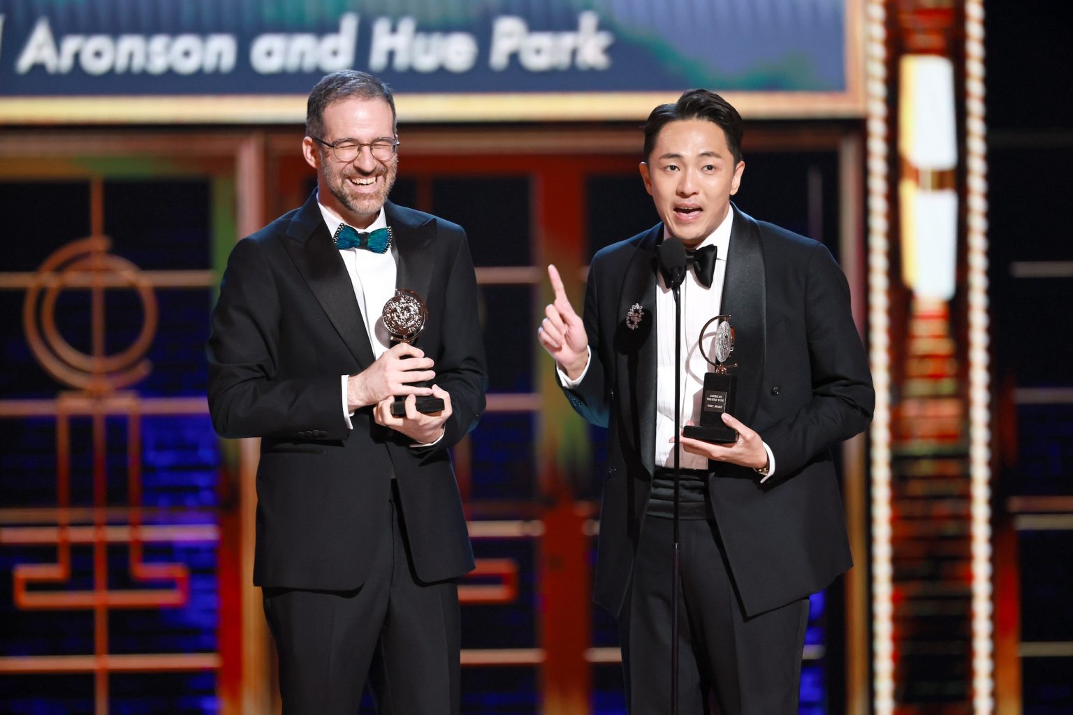 NEW YORK, NEW YORK - JUNE 08: (L-R) Will Aronson and Hue Park accept the Best Book of a Musical award for "Maybe Happy Ending" onstage during The 78th Annual Tony Awards at Radio City Music Hall on June 08, 2025 in New York City. (Photo by Theo Wargo/Getty Images for Tony Awards Productions)