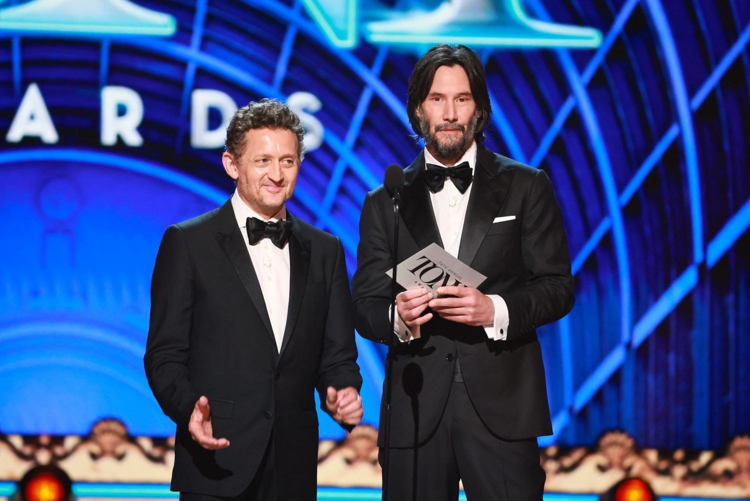 NEW YORK, NEW YORK - JUNE 08: (L-R) Alex Winter and Keanu Reeves speak onstage during The 78th Annual Tony Awards at Radio City Music Hall on June 08, 2025 in New York City. (Photo by Theo Wargo/Getty Images for Tony Awards Productions)