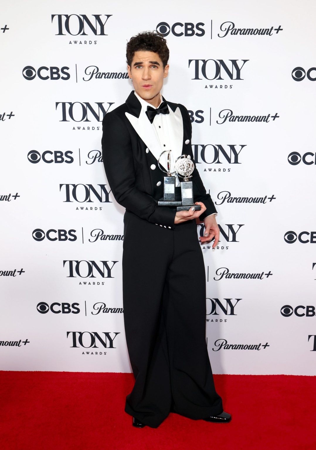 NEW YORK, NEW YORK - JUNE 08: Darren Criss poses with the Best Musical award for "Maybe Happy Ending" in the press room during the The 78th Annual Tony Awards at 3 West Club on June 08, 2025 in New York City. (Photo by Arturo Holmes/WireImage)