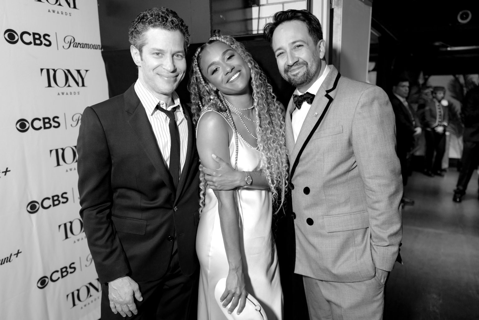 NEW YORK, NEW YORK - JUNE 08: (EDITOR’S NOTE: Image has been shot in black and white. Color version not available.) (L-R) Thomas Kail, Ariana DeBose and Lin-Manuel Miranda attend The 78th Annual Tony Awards at Radio City Music Hall on June 08, 2025 in New York City. (Photo by Jenny Anderson/Getty Images for Tony Awards Productions)