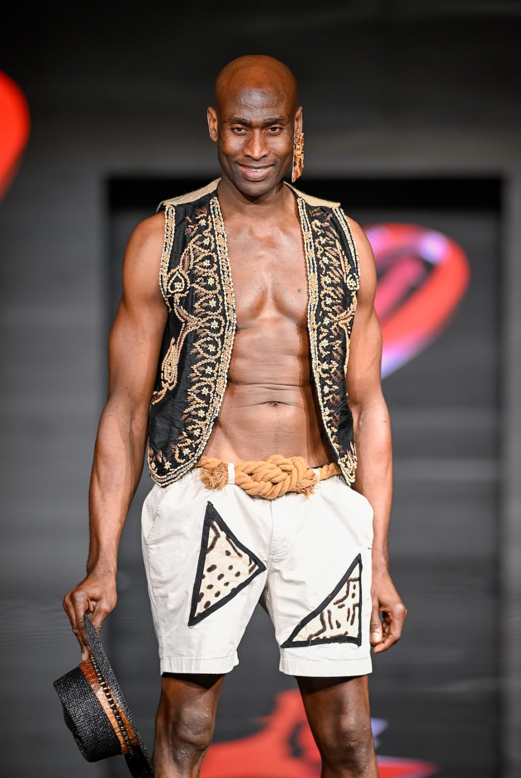 MIAMI BEACH, FLORIDA - MAY 31: A model walks the runway at the Love For Upcycling show during Miami Swim Week Powered By Art Hearts Fashion at Eden Roc Hotel on May 31, 2025 in Miami Beach, Florida. (Photo by Arun Nevader/Getty Images for Art Hearts Fashion)