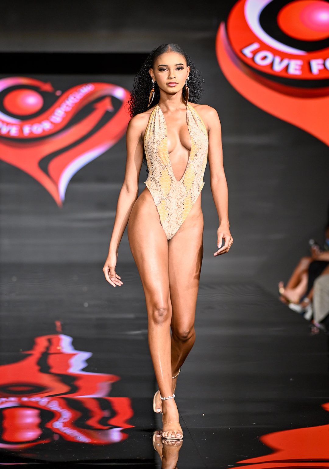 MIAMI BEACH, FLORIDA - MAY 31: A model walks the runway at the Love For Upcycling show during Miami Swim Week Powered By Art Hearts Fashion at Eden Roc Hotel on May 31, 2025 in Miami Beach, Florida. (Photo by Arun Nevader/Getty Images for Art Hearts Fashion)
