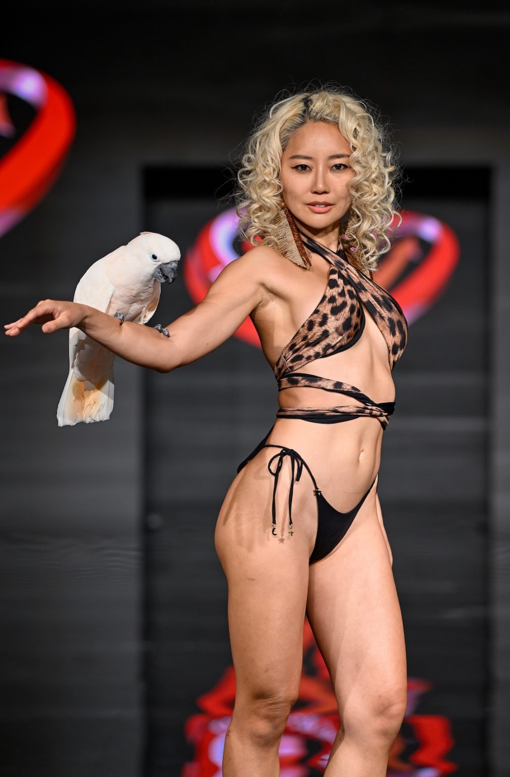 MIAMI BEACH, FLORIDA - MAY 31: A model walks the runway at the Love For Upcycling show during Miami Swim Week Powered By Art Hearts Fashion at Eden Roc Hotel on May 31, 2025 in Miami Beach, Florida. (Photo by Arun Nevader/Getty Images for Art Hearts Fashion)