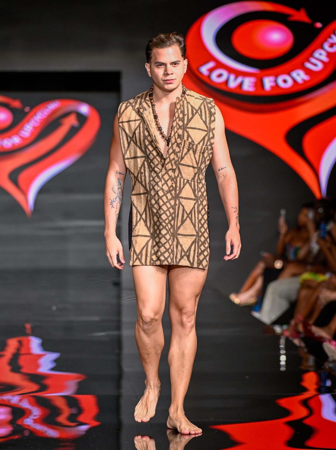 MIAMI BEACH, FLORIDA - MAY 31: A model walks the runway at the Love For Upcycling show during Miami Swim Week Powered By Art Hearts Fashion at Eden Roc Hotel on May 31, 2025 in Miami Beach, Florida. (Photo by Arun Nevader/Getty Images for Art Hearts Fashion)