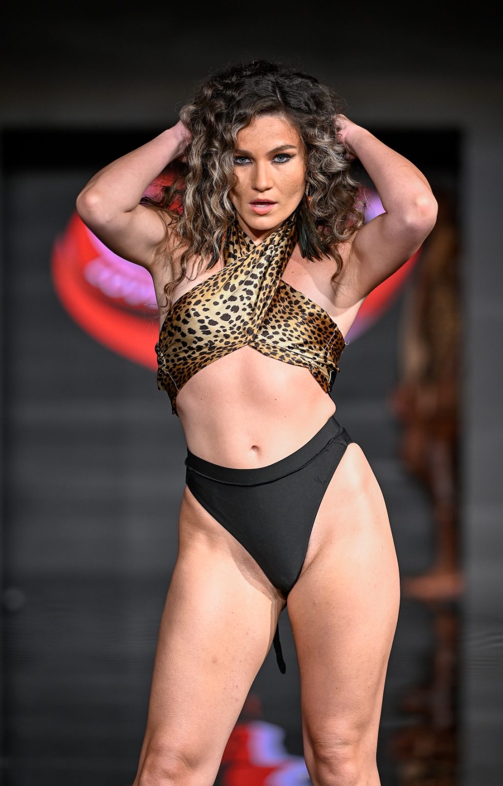 MIAMI BEACH, FLORIDA - MAY 31: A model walks the runway at the Love For Upcycling show during Miami Swim Week Powered By Art Hearts Fashion at Eden Roc Hotel on May 31, 2025 in Miami Beach, Florida. (Photo by Arun Nevader/Getty Images for Art Hearts Fashion)